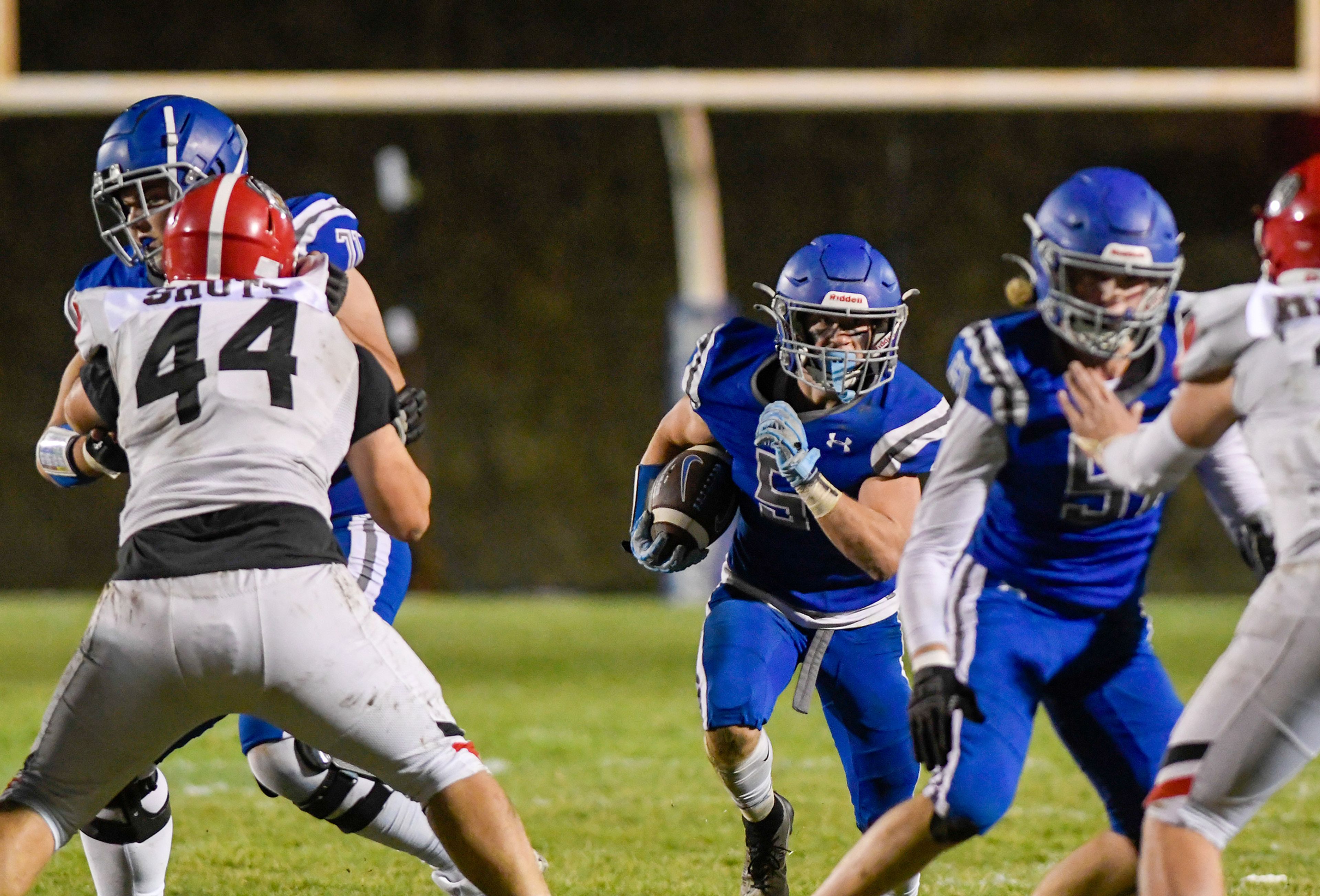 Pullmans Brady Coulter eyes Clarkston defenders while carrying the ball Friday in Pullman.,