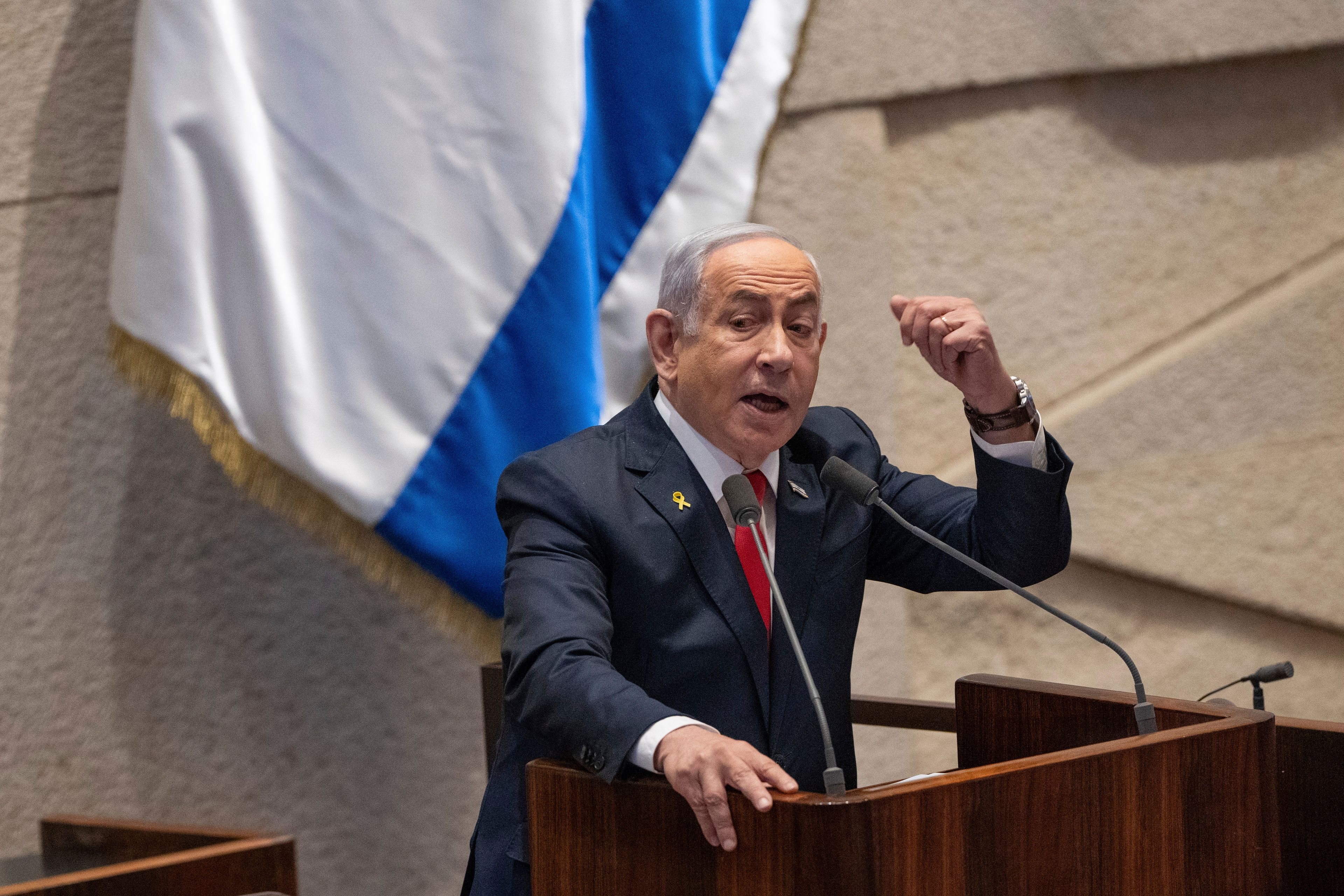 FILE - Israel's Prime Minister Benjamin Netanyahu addresses lawmakers in the Knesset, Israel's parliament, in Jerusalem. Monday Nov. 18, 2024. (AP Photo/Ohad Zwigenberg, File)