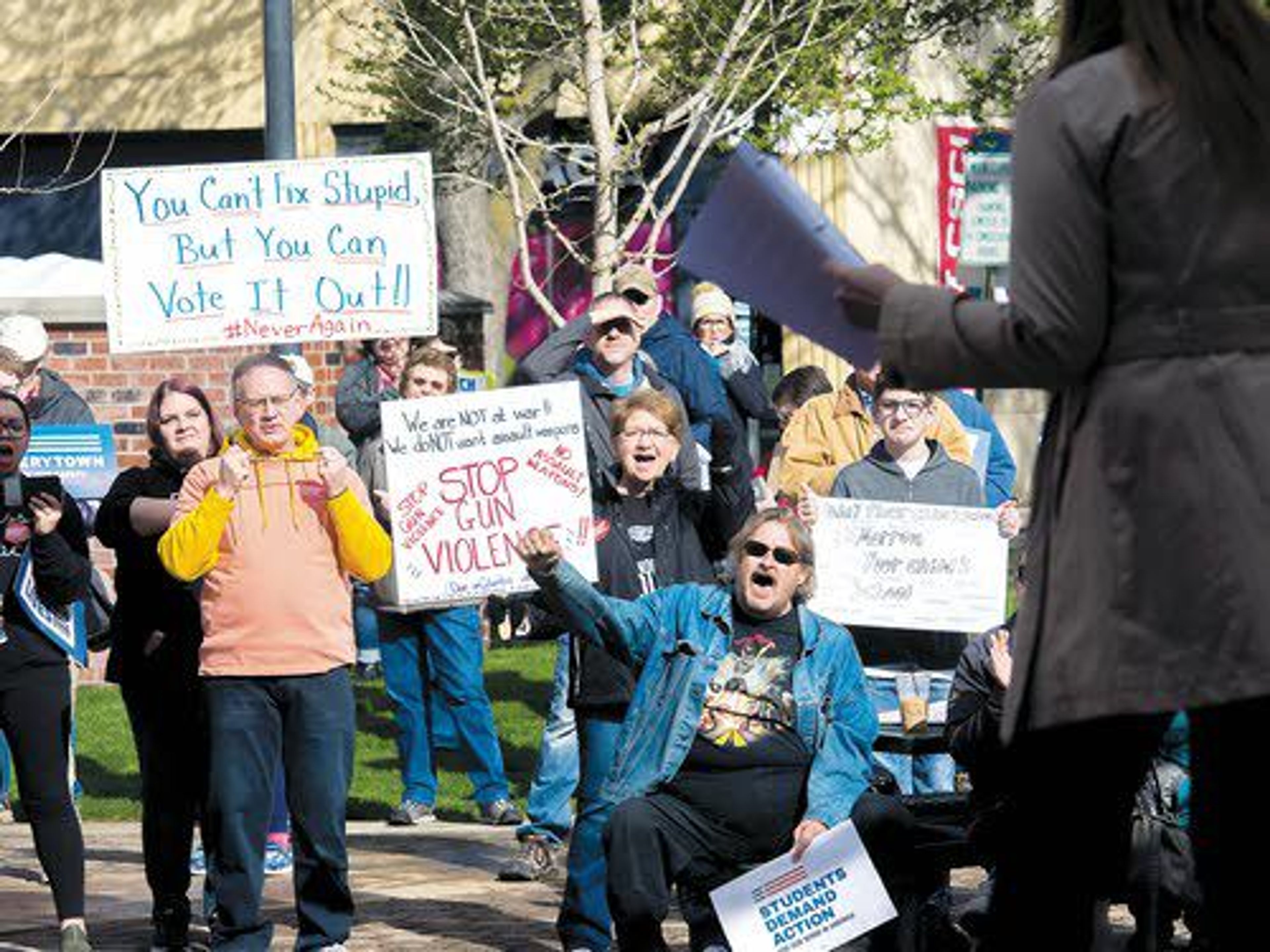 The crowd reacts positively as Christine Jorgens speaks during the March for Our Lives Rally Saturday at Brackenbury Square in downtown Lewiston. Similar rallies were held across the country calling for stricter gun-control laws. See stories, pages 1A and 4A.