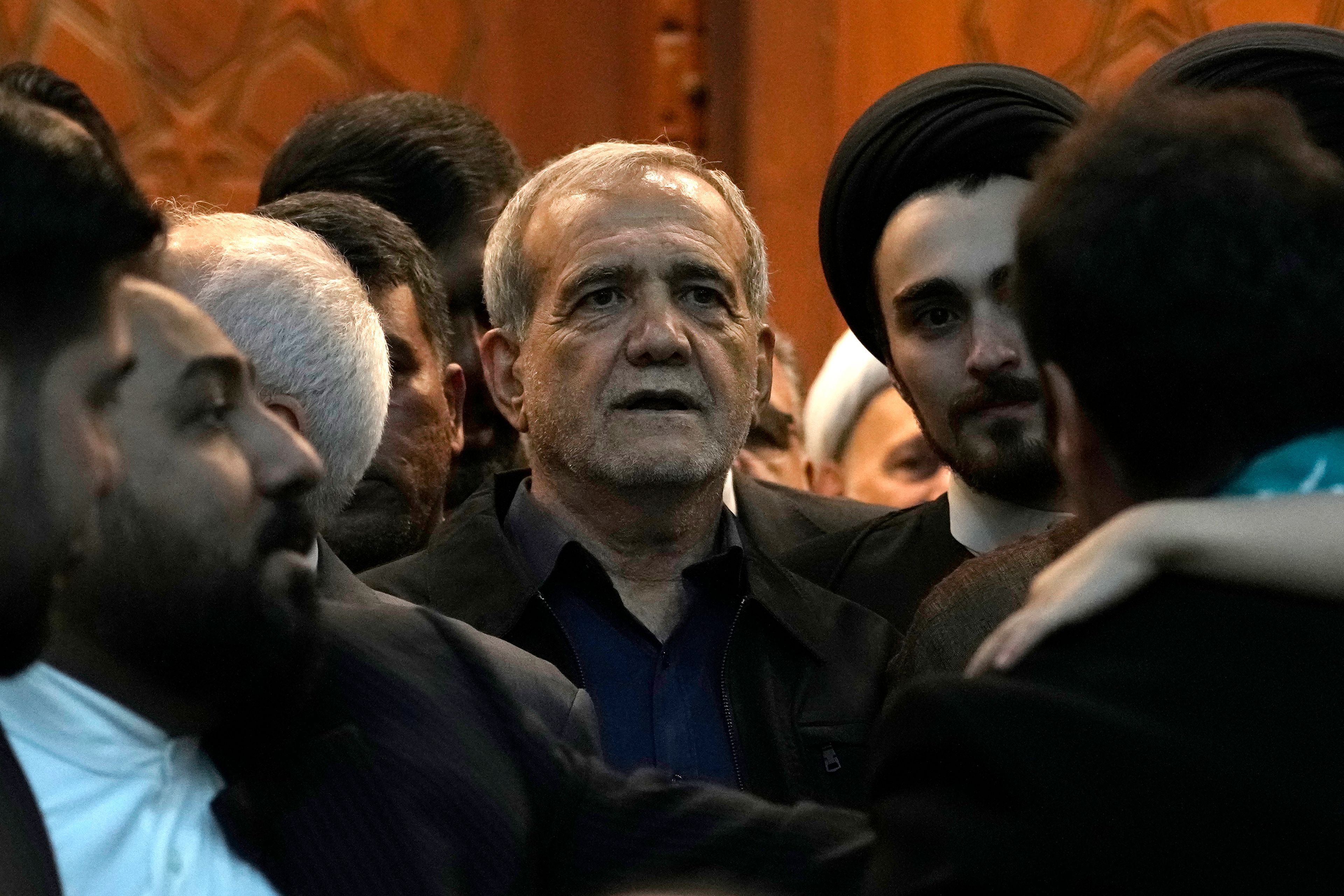 Iran's President-elect Masoud Pezeshkian arrives to attend a meeting a day after the presidential election, at the shrine of the late revolutionary founder Ayatollah Khomeini, just outside Tehran, Iran, Saturday, July 6, 2024. (AP Photo/Vahid Salemi)