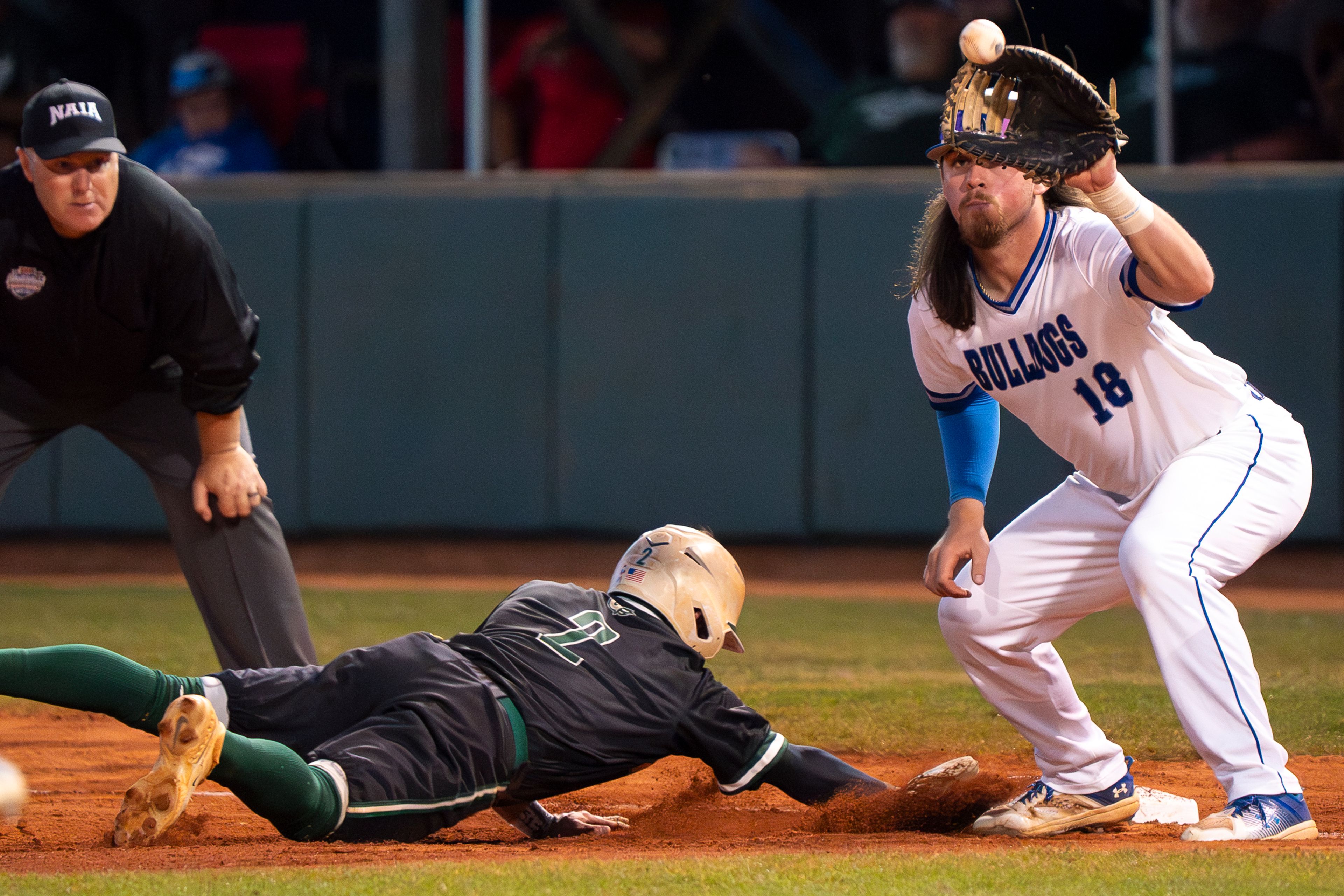 Tennessee Wesleyan first basemen Evan Magill catches a throw to first during game 12 of the NAIA World Series against Georgia Gwinnett on Monday at Harris Field in Lewiston.