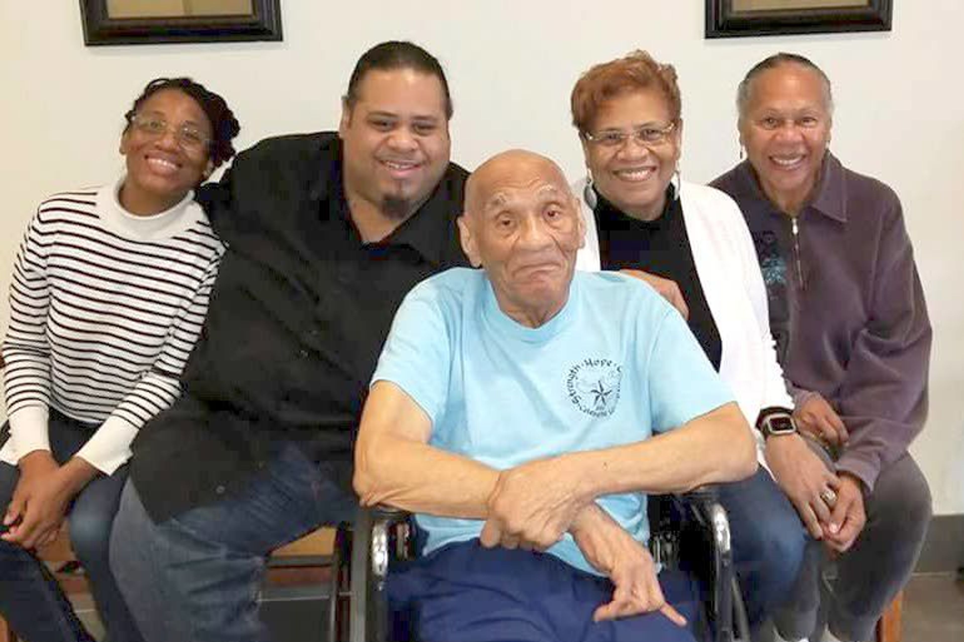 Kenneth Bowser (middle) visits with, from left, grandchildren Tonya Cotton and Mark Cotton and daughters Sharon Van Leer and Janet Bowser at a locked forensic nursing home in St. Peter, Minn., in 2016. He was sent to the home after he fatally shot his son and caretaker, Larry, in 2015, and was deemed unfit to stand trial because of his dementia.