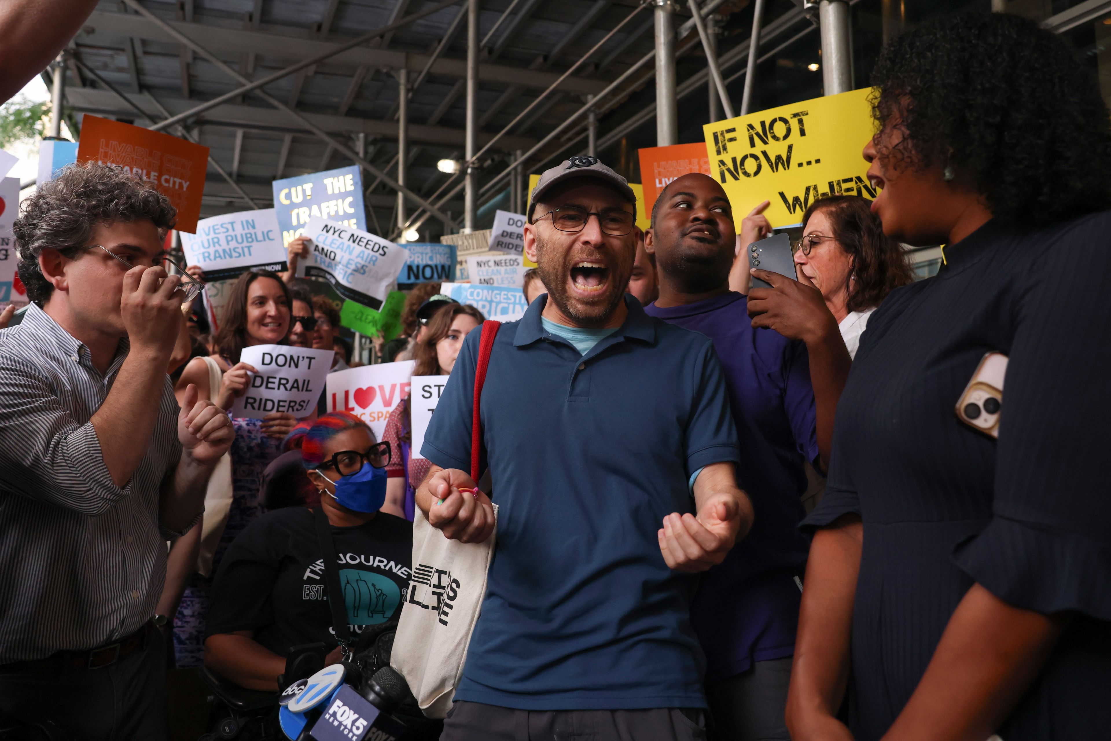 Protesters demonstrate outside New York Gov. Kathy Hochul's Manhattan office, Wednesday, June 5, 2024, in New York. Hochul is indefinitely delaying implementation of a plan to charge motorists big tolls to enter the core of Manhattan, just weeks before the nation's first "congestion pricing" system was set to launch.