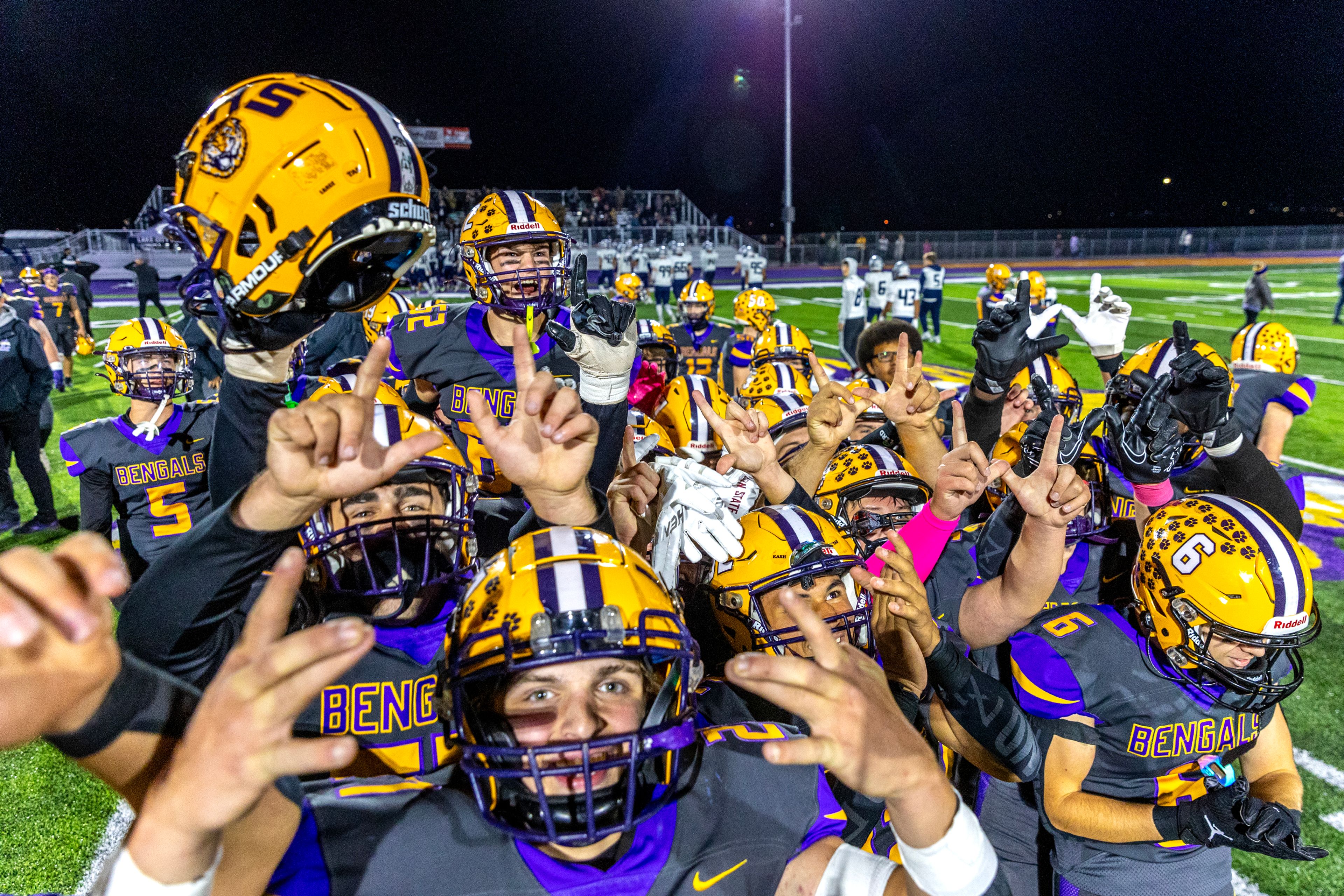 Lewiston celebrates their victory over Lake City in a nonconference game Friday at Lewiston High School.,