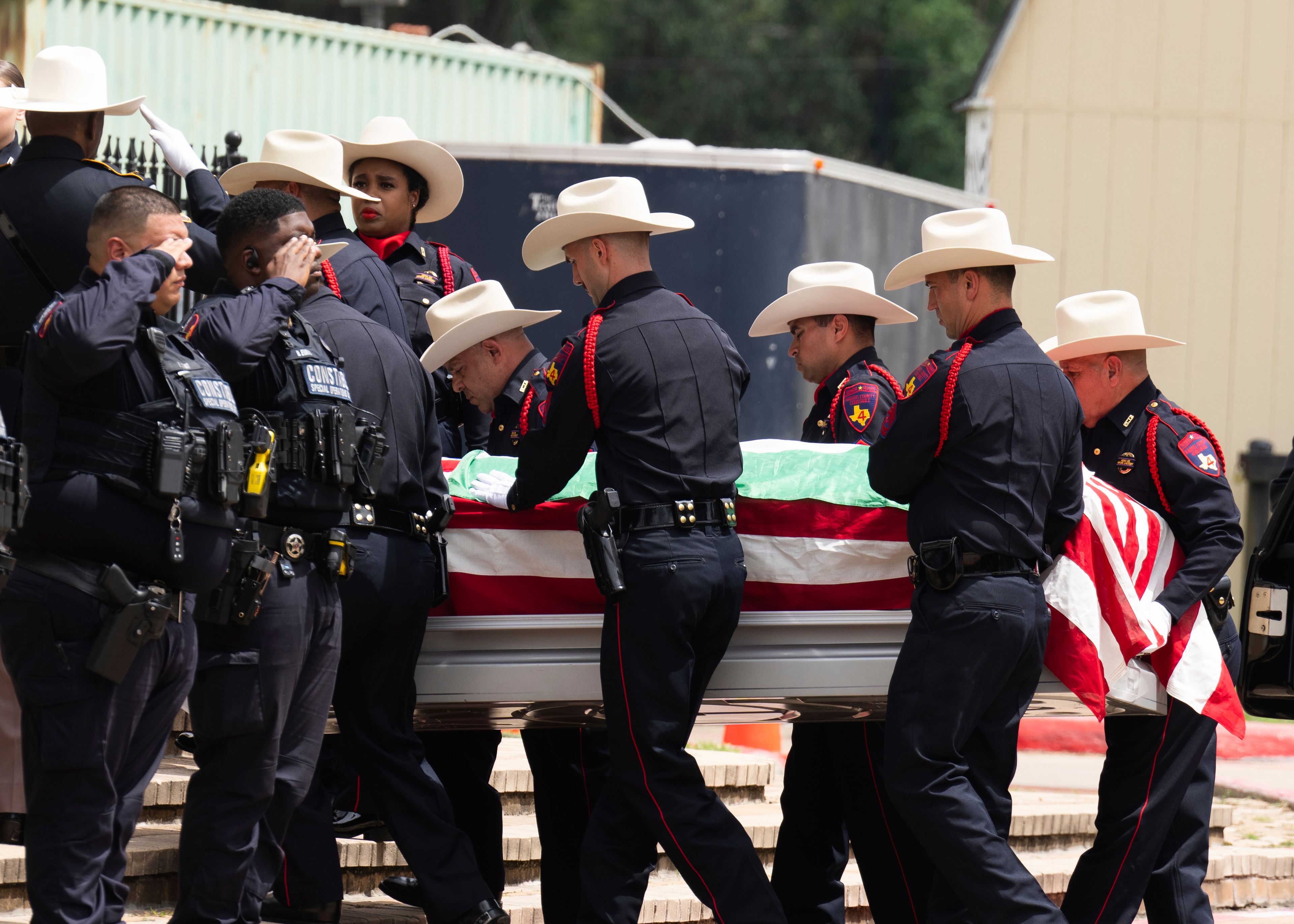 The casket of Harris County Precinct 4 Deputy Constables arrives as family, friends and law enforcement gather for funeral prayers at Masjid Al Salem Mosque, Thursday, Sept. 5, 2024, in Spring, Texas.