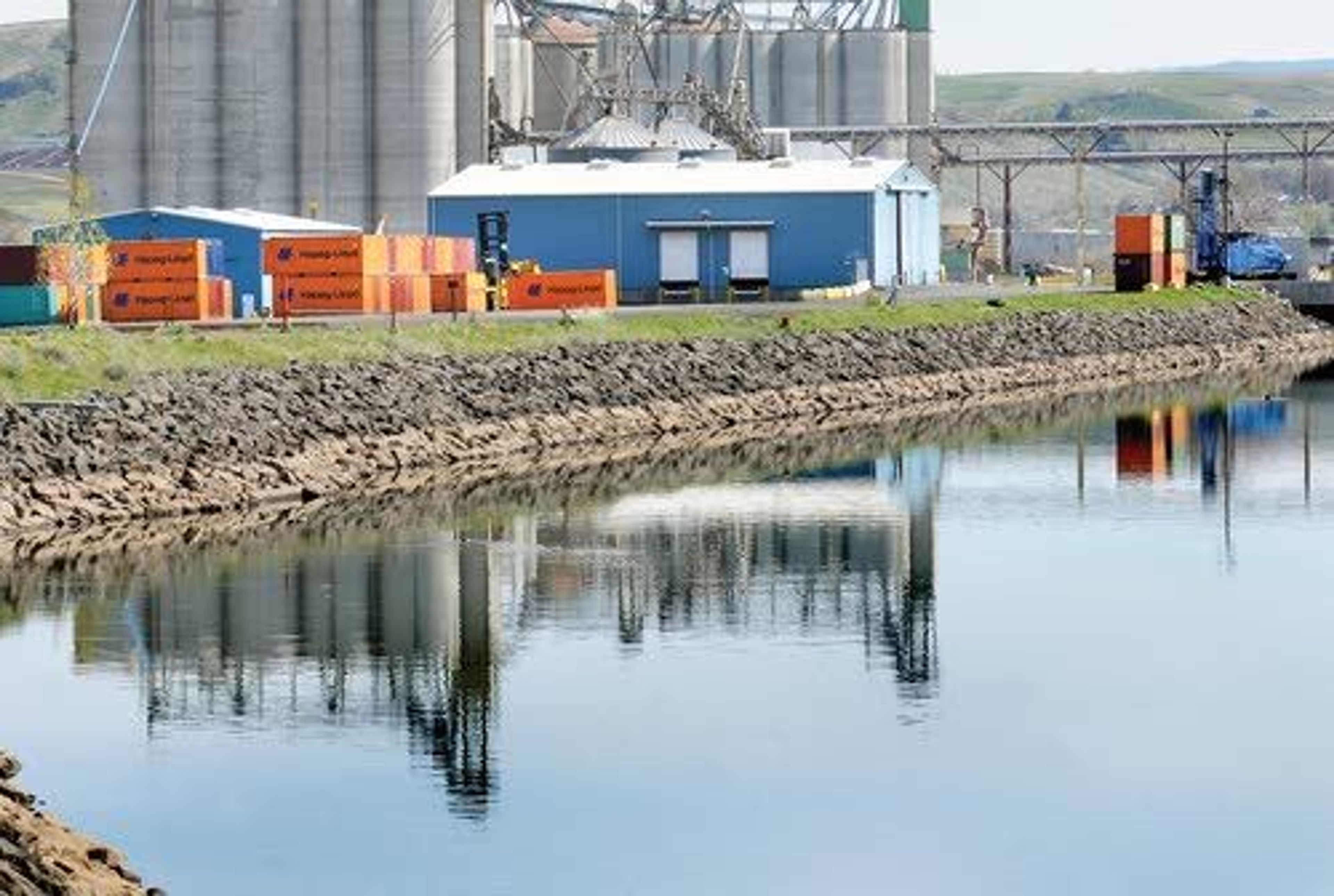 Several Hapag-Lloyd containers sit idle Tuesday at the Port of Lewiston along the banks of the Clearwater River. Hapag-Lloyd, which supplies 90 percent of the containers to Lewiston, has announced it’s pulling out of the Port of Portland in Oregon.