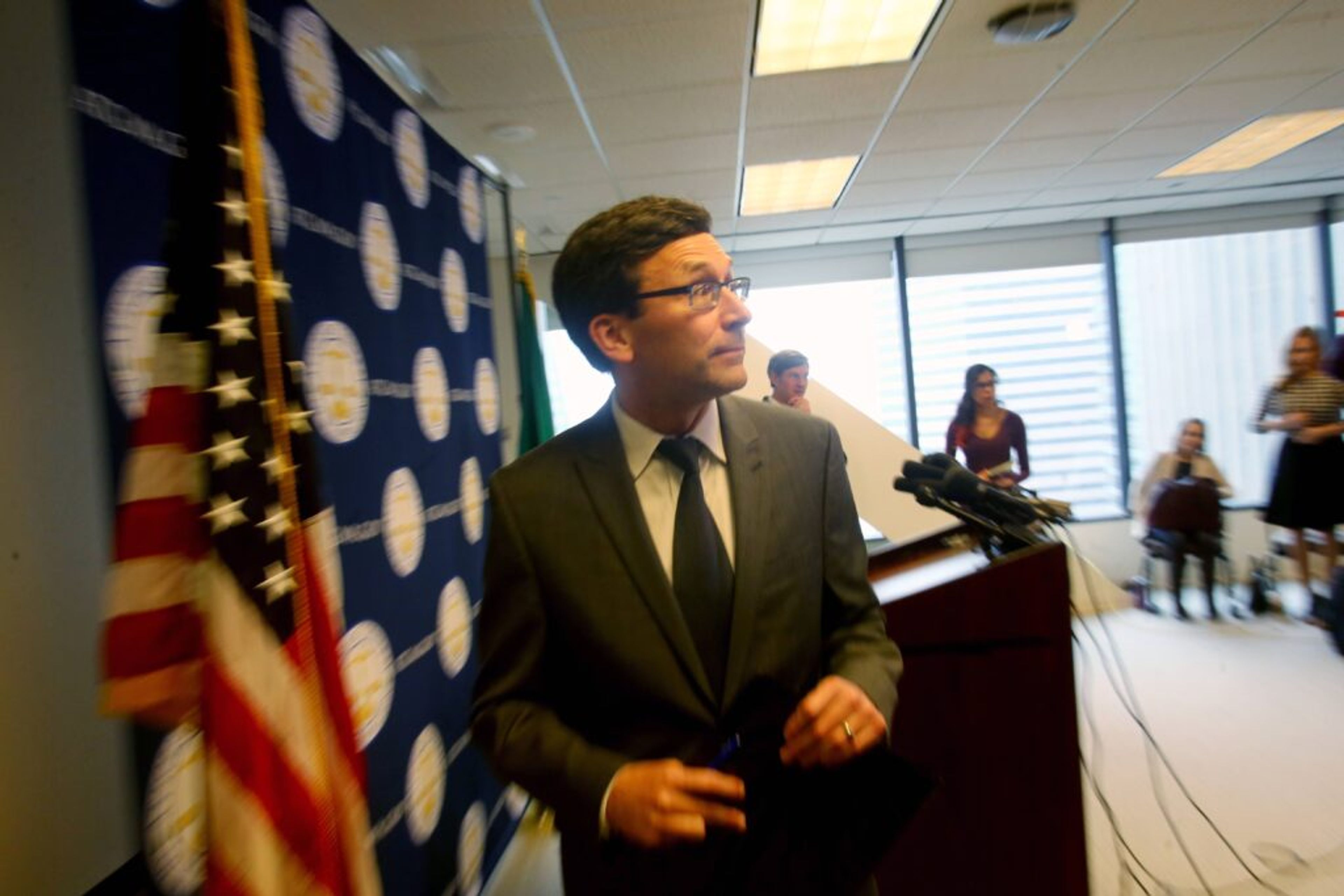 SEATTLE, WA - MARCH 09: Washington State Attorney General Bob Ferguson exits the press conference after he announced his decision on potential action regarding President Donald Trumpâ€™s latest Executive Order on immigration on March 9, 2017 in Seattle, Washington. (Photo by Karen Ducey/Getty Images)