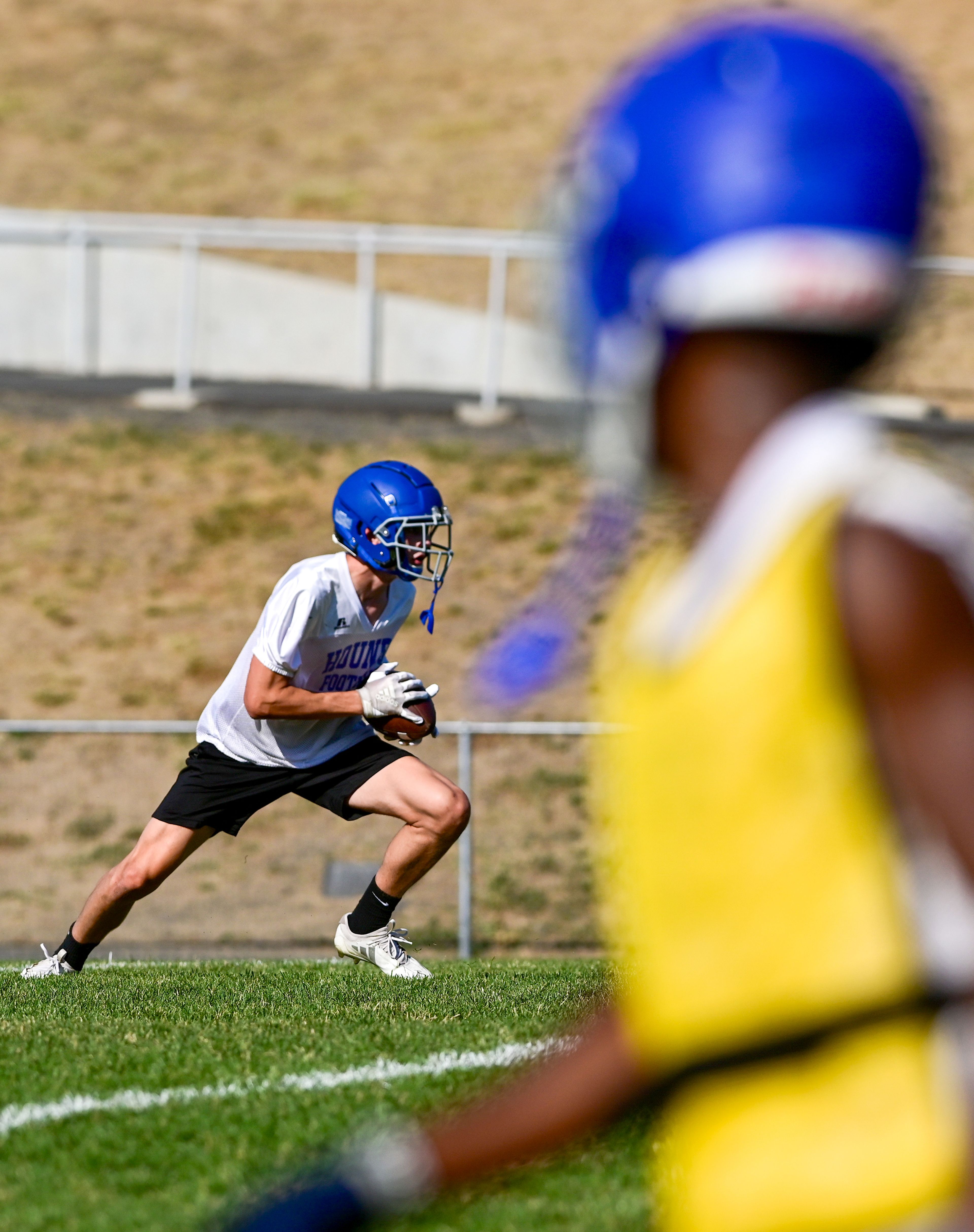 Pullman runs plays during practice on Wednesday.