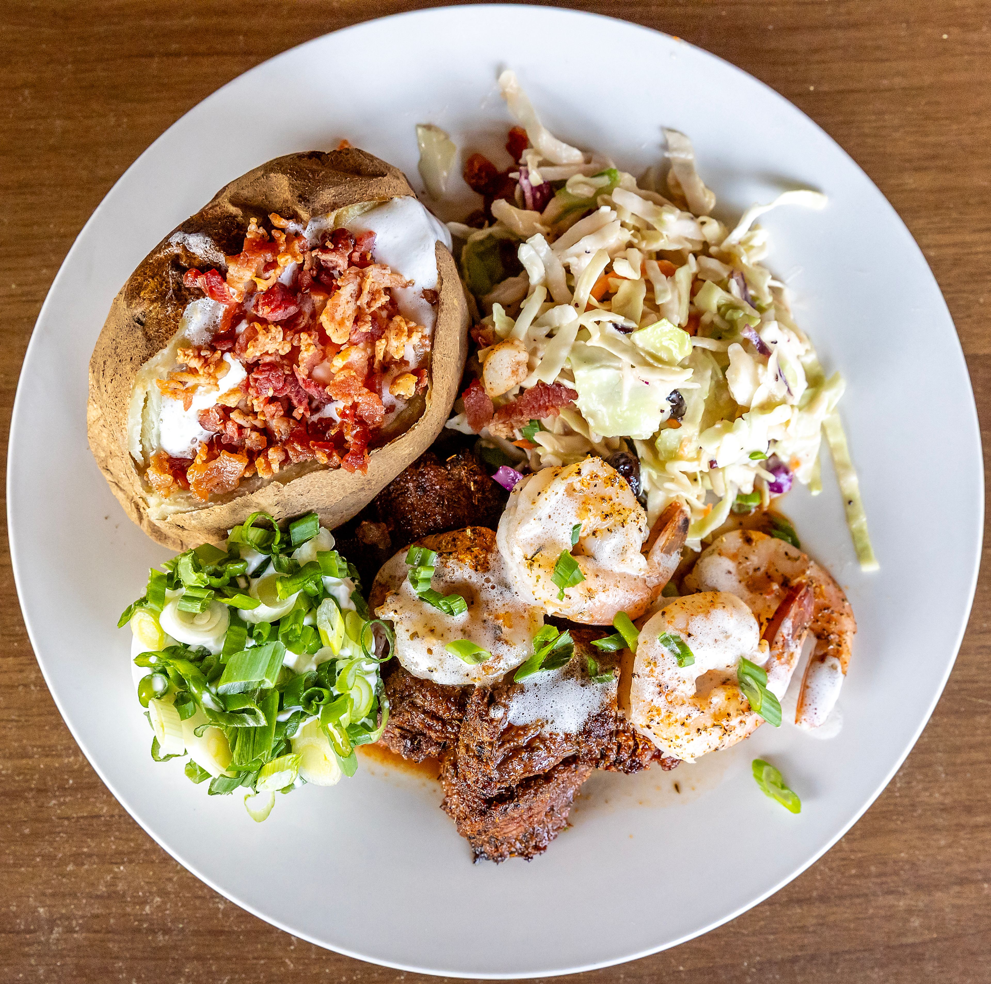 A plate of surf and turf is pictured at Seasons Bites and Burgers Wednesday in Lewiston.