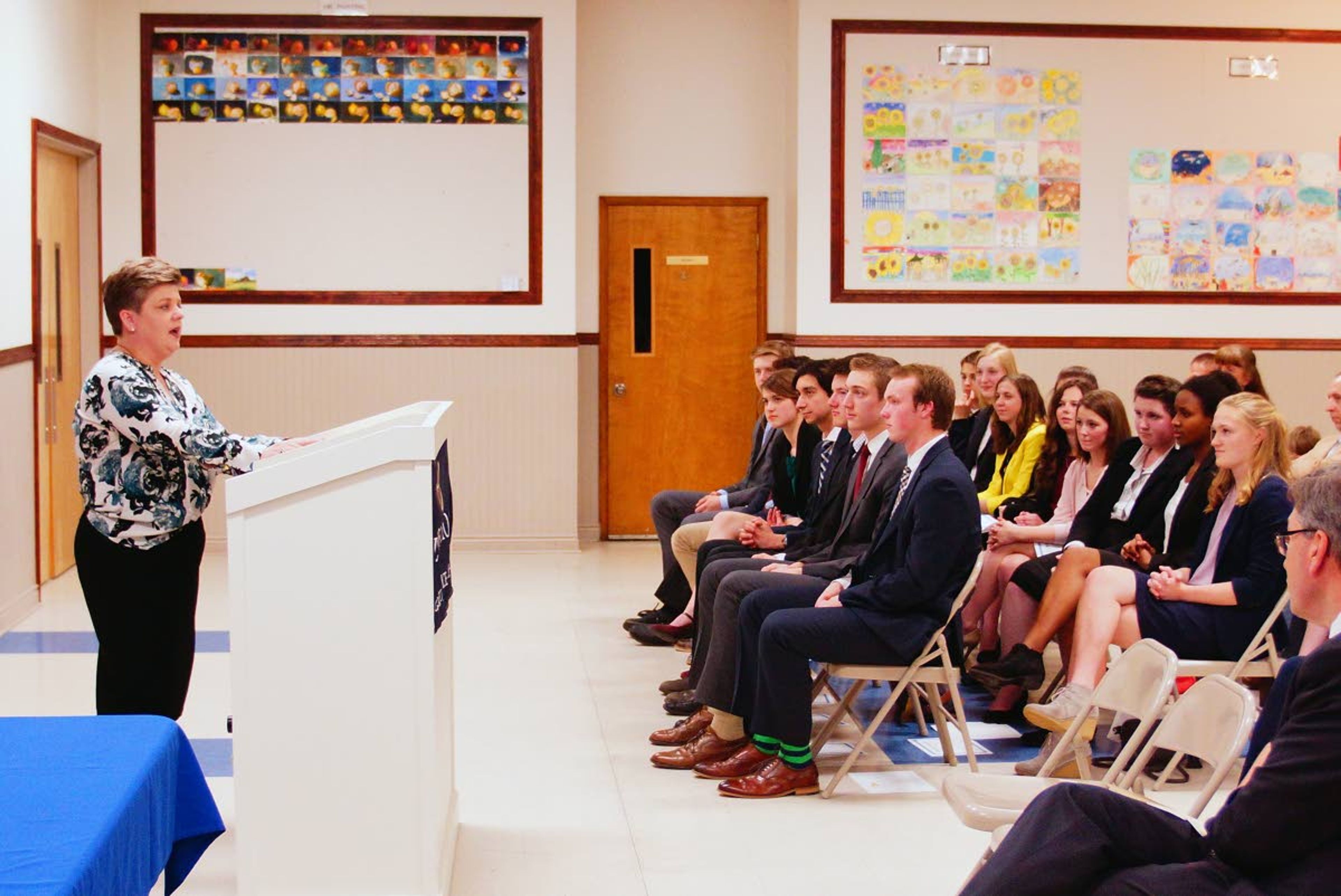 Idaho Supreme Court Justice Robyn Brody speaks to the Logos School mock trial teams in Moscow Wednesday evening during an awards ceremony.