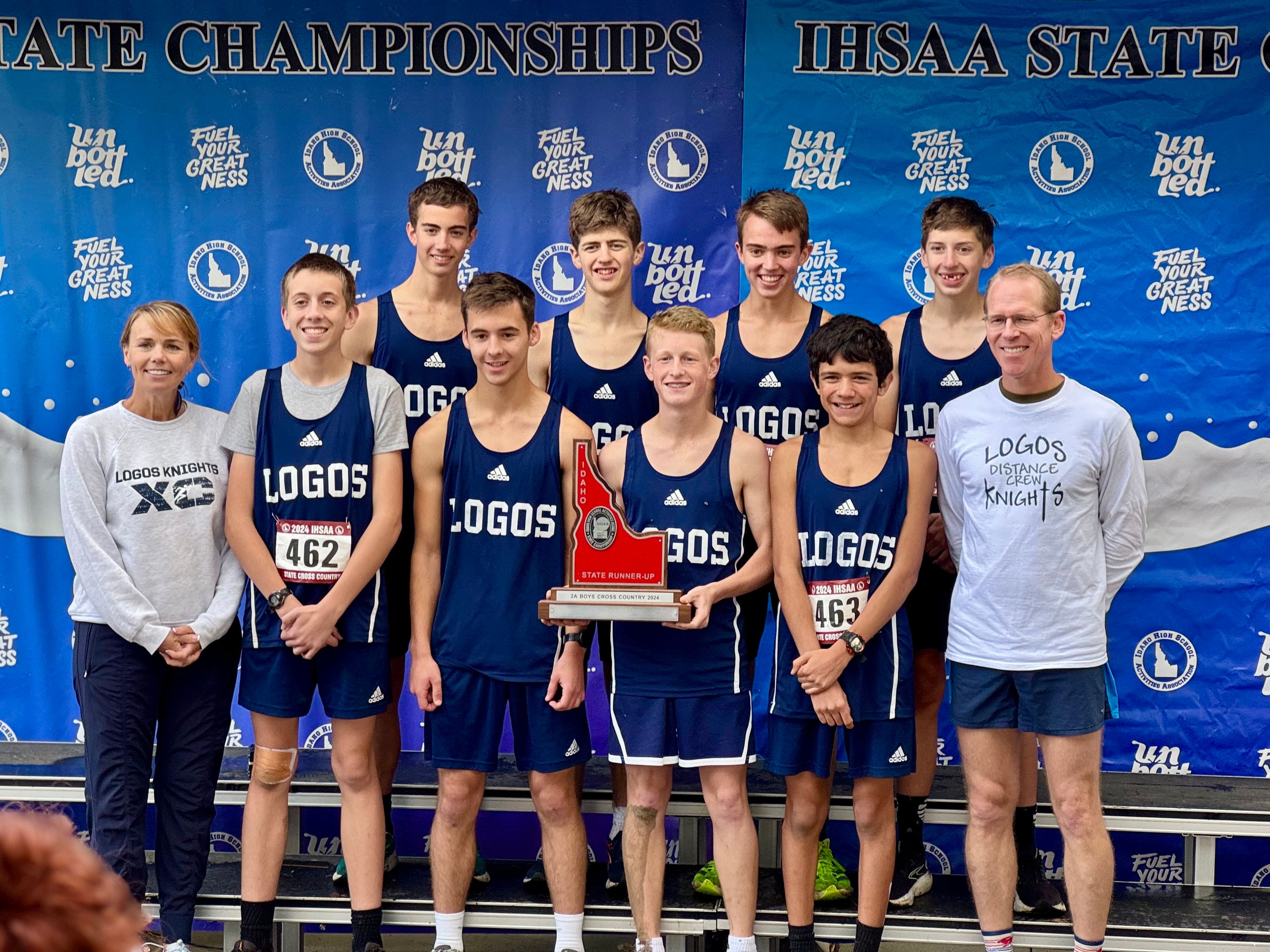 The Logos Knights boys cross country team poses with its second-place trophy at the Class 2A Idaho cross country meet Saturday, Nov. 2, in Eagle, Idaho.