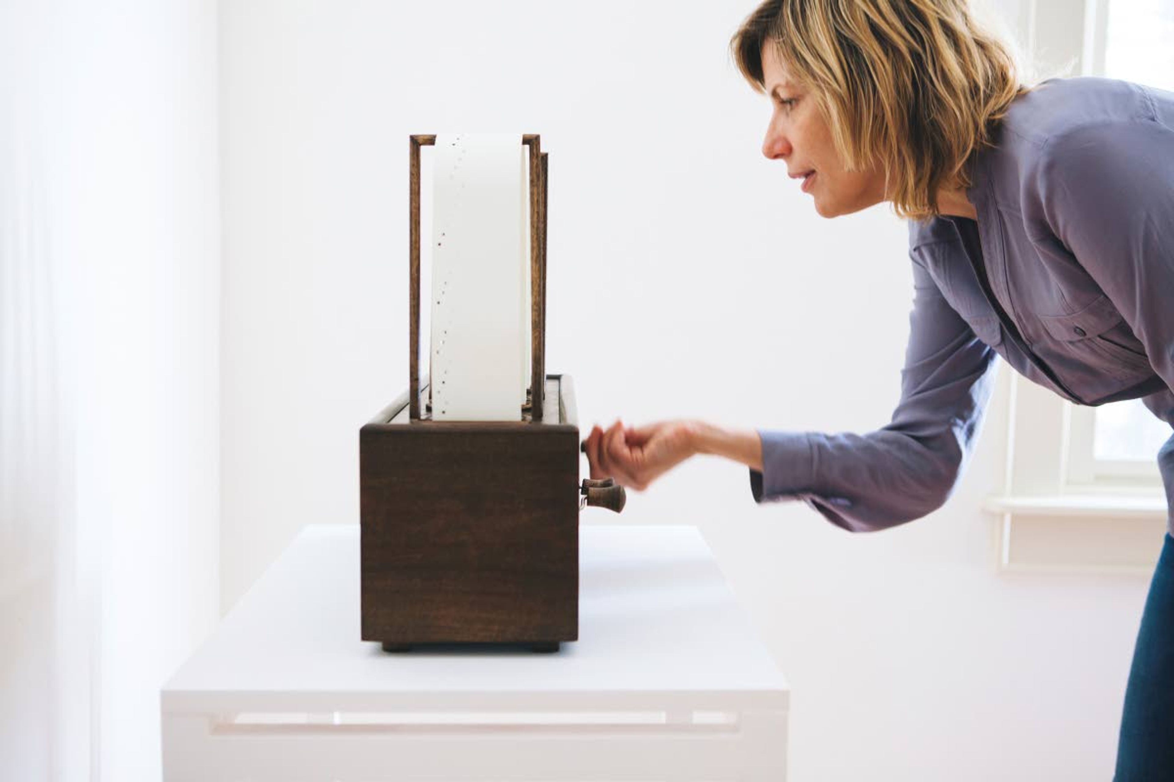 Artist Margaret Noble is shown with her interactive exhibit, which is on display at the Lewis-Clark State College Center for Arts & History in downtown Lewiston.