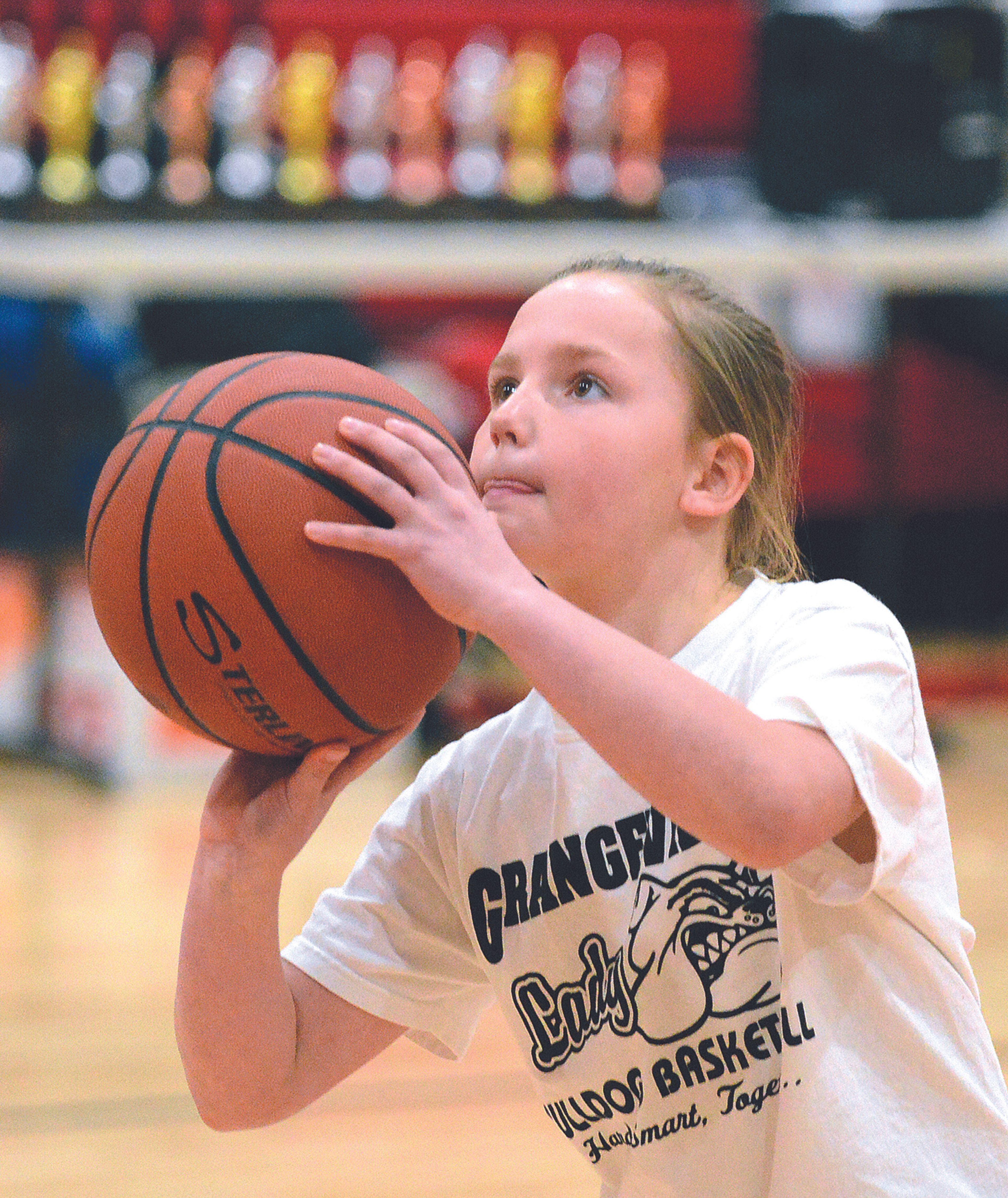 Caryss Barger of Grangeville eyes the basket during the North Central Idaho District Elks Lodge Hoop Shoot on Saturday at Clarkston’s Lincoln Middle School. Barger made 18 of 25 shots to win the 8-9-year-old girls’ division and advance to Saturday’s state competition at Grangeville. Results from the district Hoop Shoot will appear in the Tribune’s Community Sports Report on Tuesday.