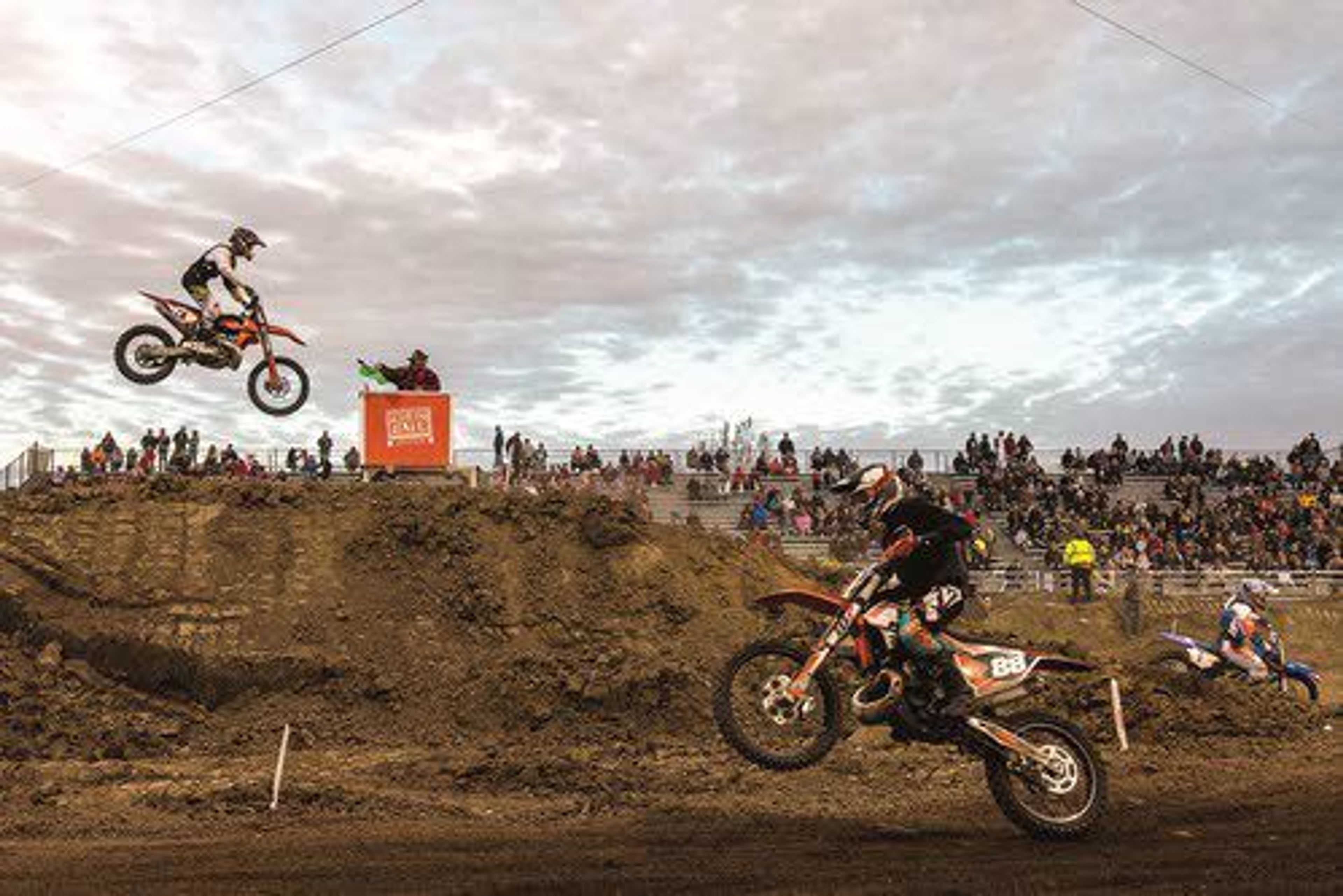 Racers make their way through the course during the 450 pro/250 intermediate qualifier race on Saturday night at the Lewiston Supercross event at the Lewiston Roundup Grounds.