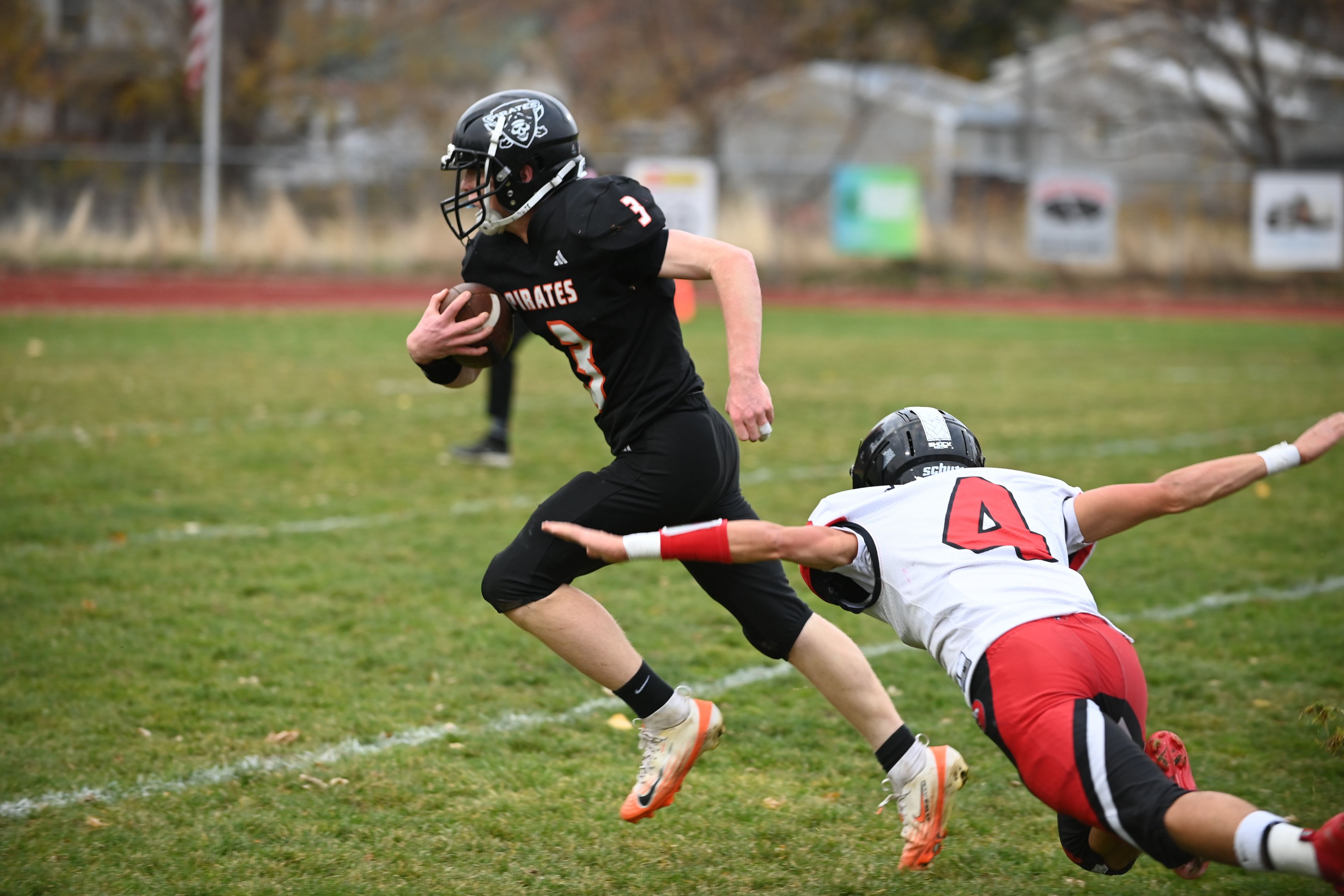 Pirates run through Hawks in state football opener