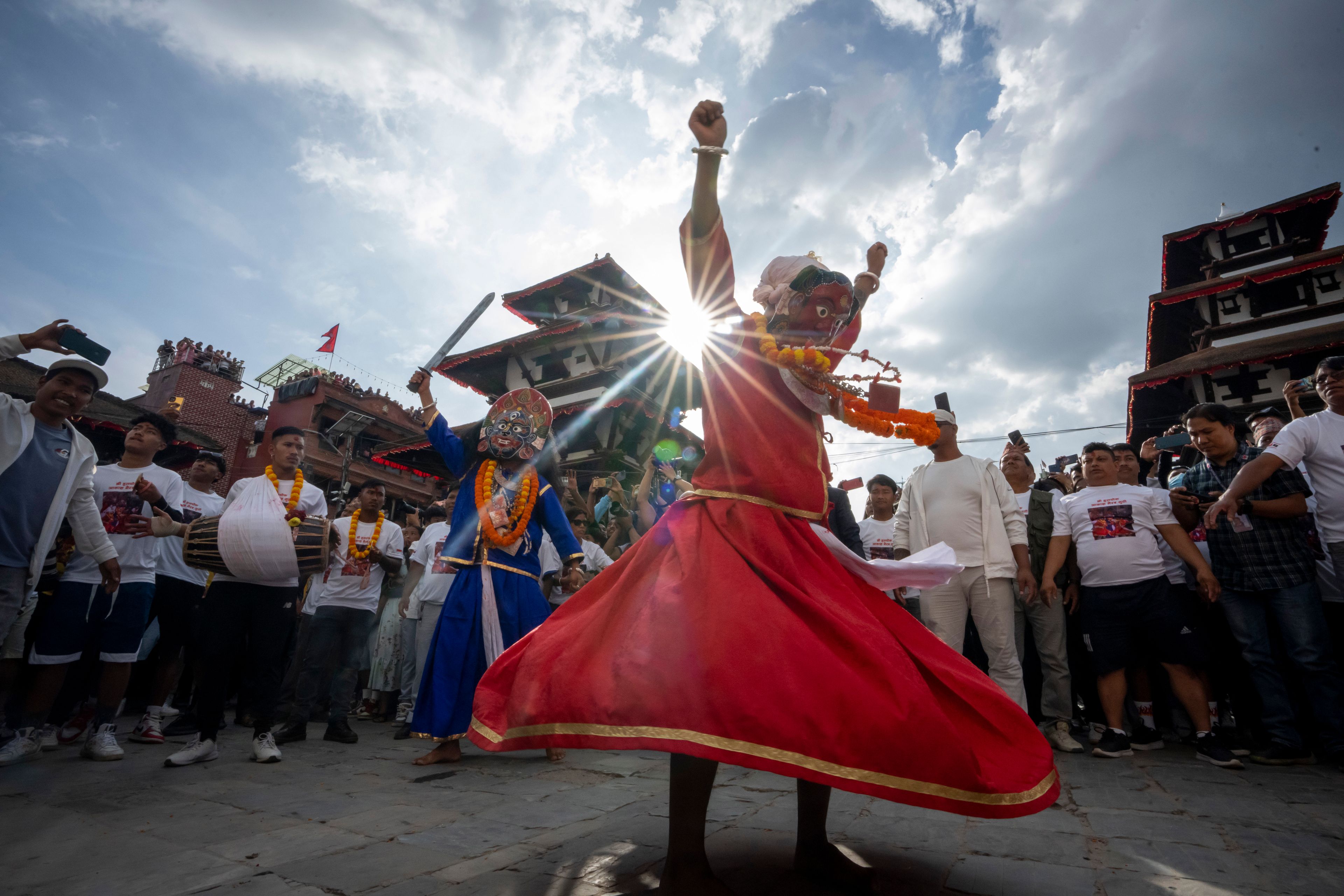 Masked dancers perform during Indra Jatra, a festival that marks the end of the rainy season in Kathmandu, Nepal, Tuesday, Sept. 17, 2024. (AP Photo/Niranjan Shrestha)
