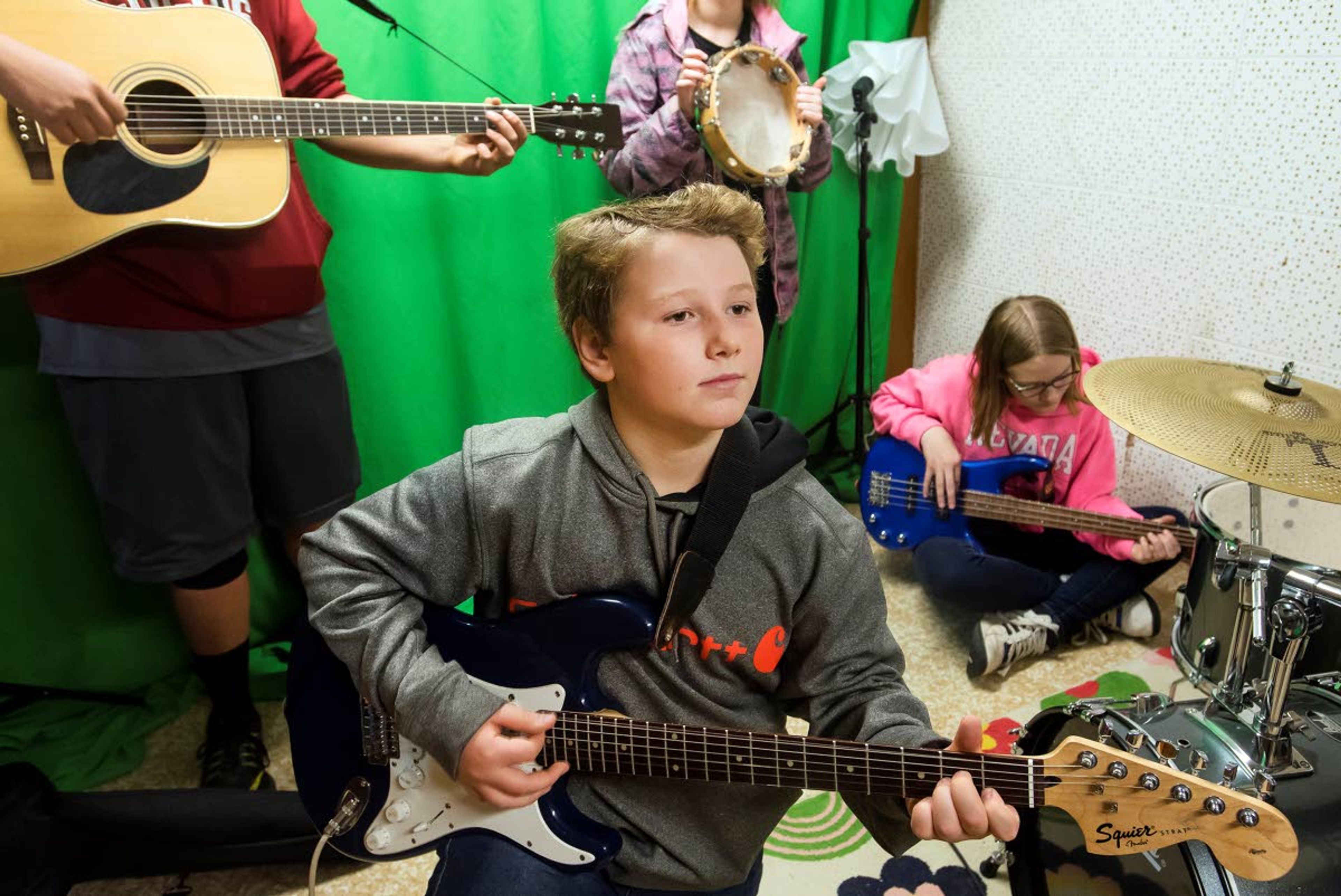 Mason Dove plays electric guitar in his country band, "Route 66," during modern band class at Nezperce School on Tuesday in Nezperce.