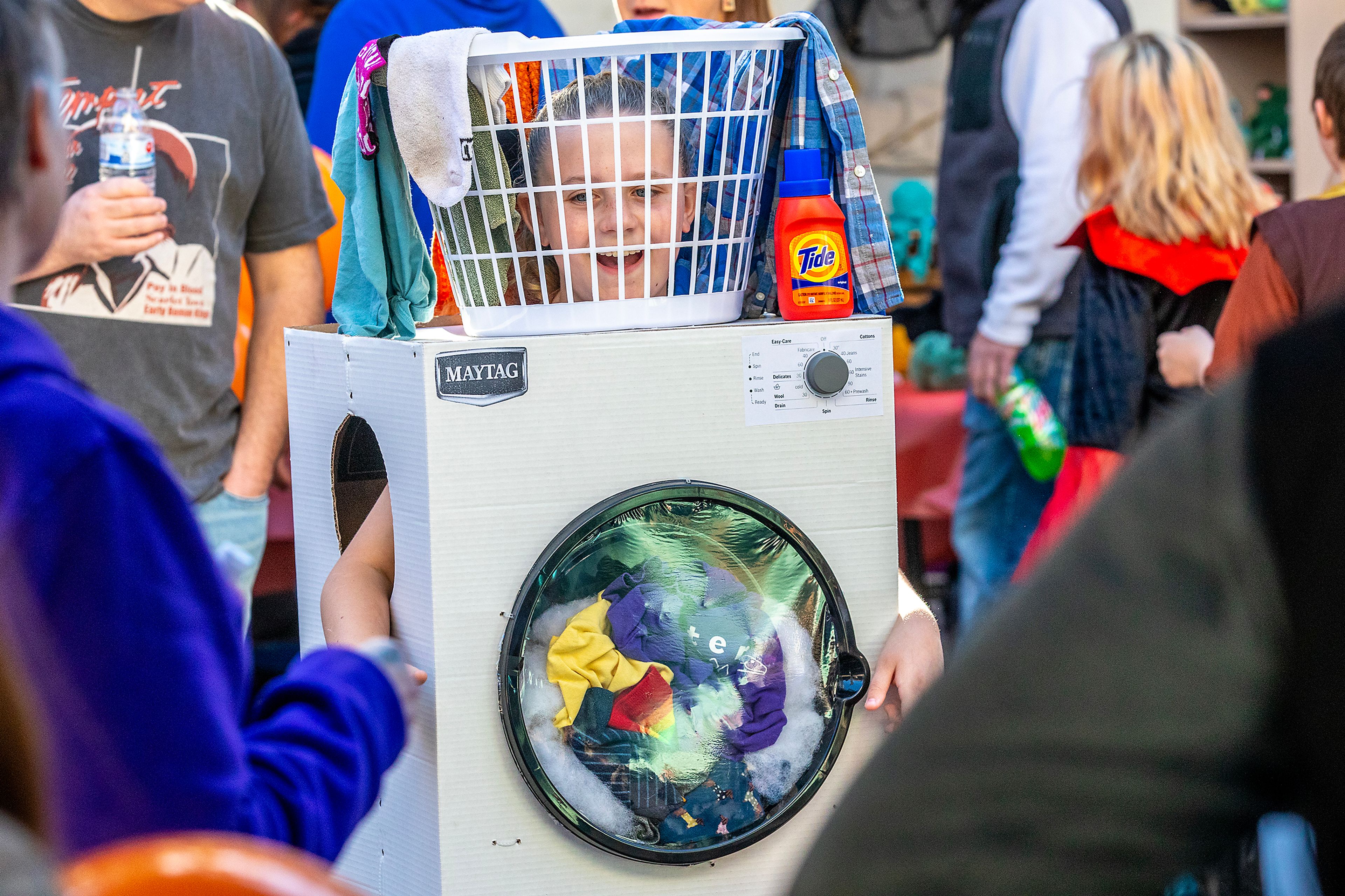 Lucy Baney dresses as a washing machine Saturday at Pumpkin Palooza in downtown Lewiston.,