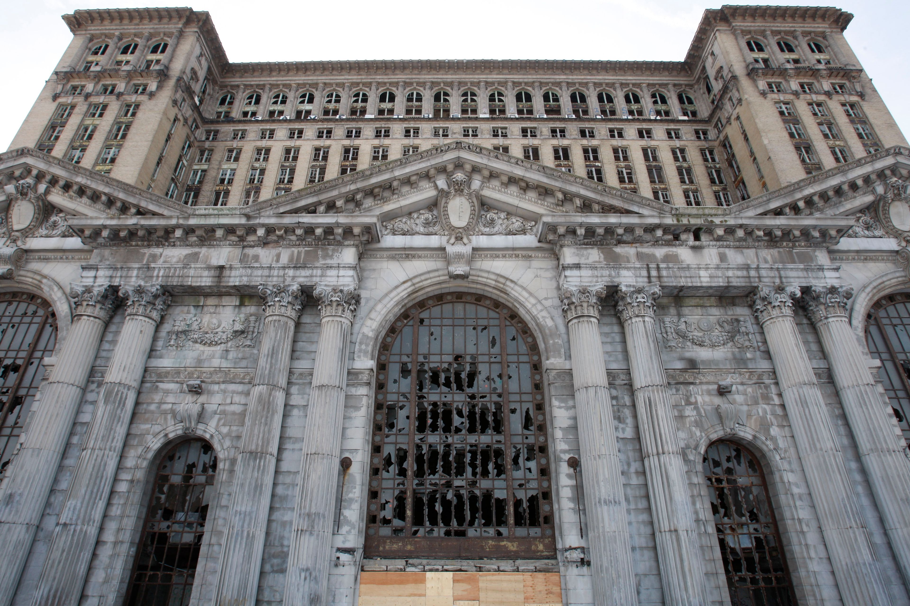 FILE- The exterior of the Michigan Central Station is seen, Thursday, Jan. 21, 2010 in Detroit. A once hulking scavenger-ravaged monolith that symbolized Detroit's decline reopens this week after a massive six-year multimillion dollar renovation by Ford Motor Co., which restored the Michigan Central Station to its past grandeur with a focus squarely on the future of mobility.