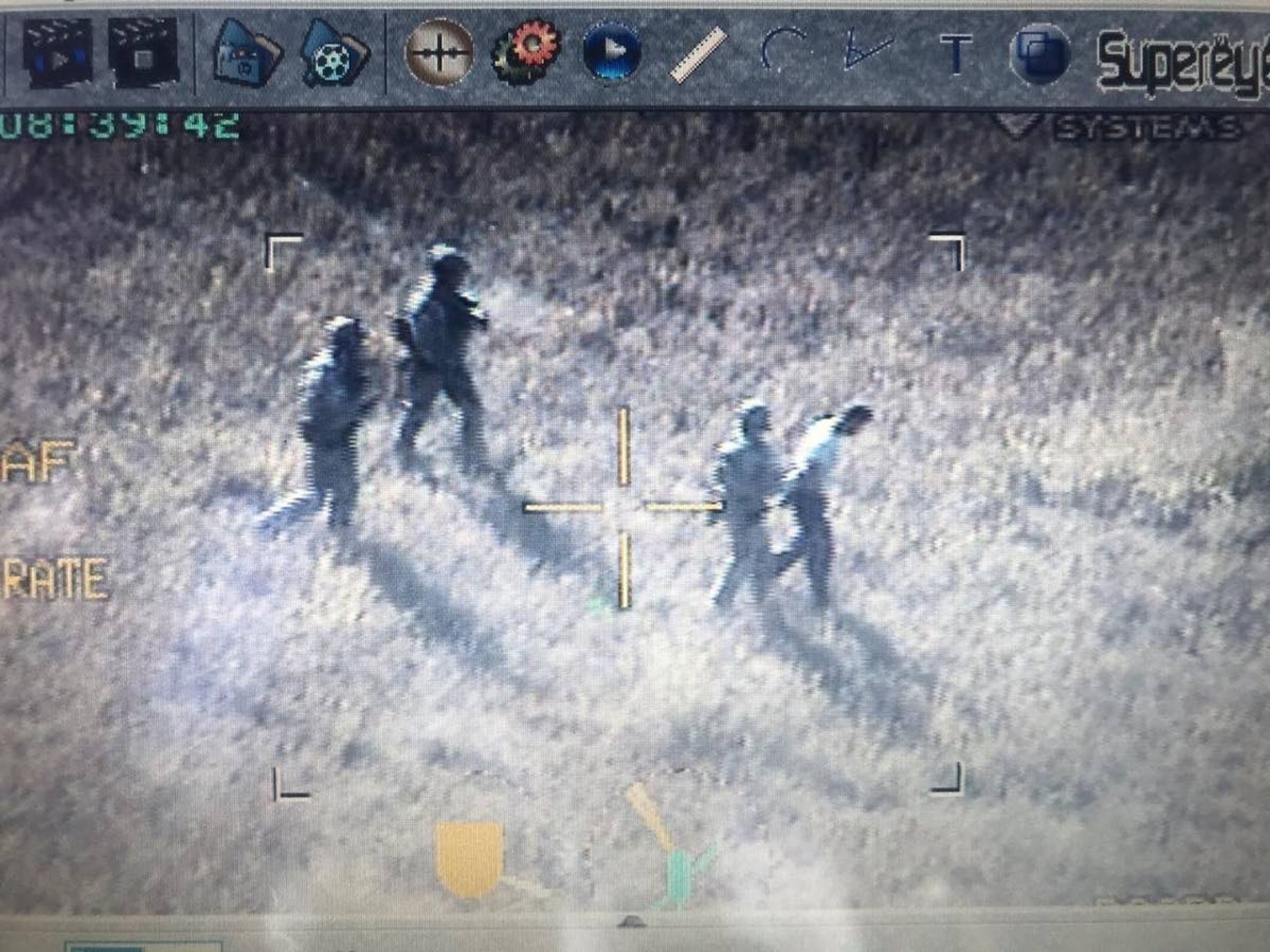 This image, provided by the Idaho County Sheriff's Office, shows Jackie Shayde Sedillo being led away by officers after being caught Wednesday morning.