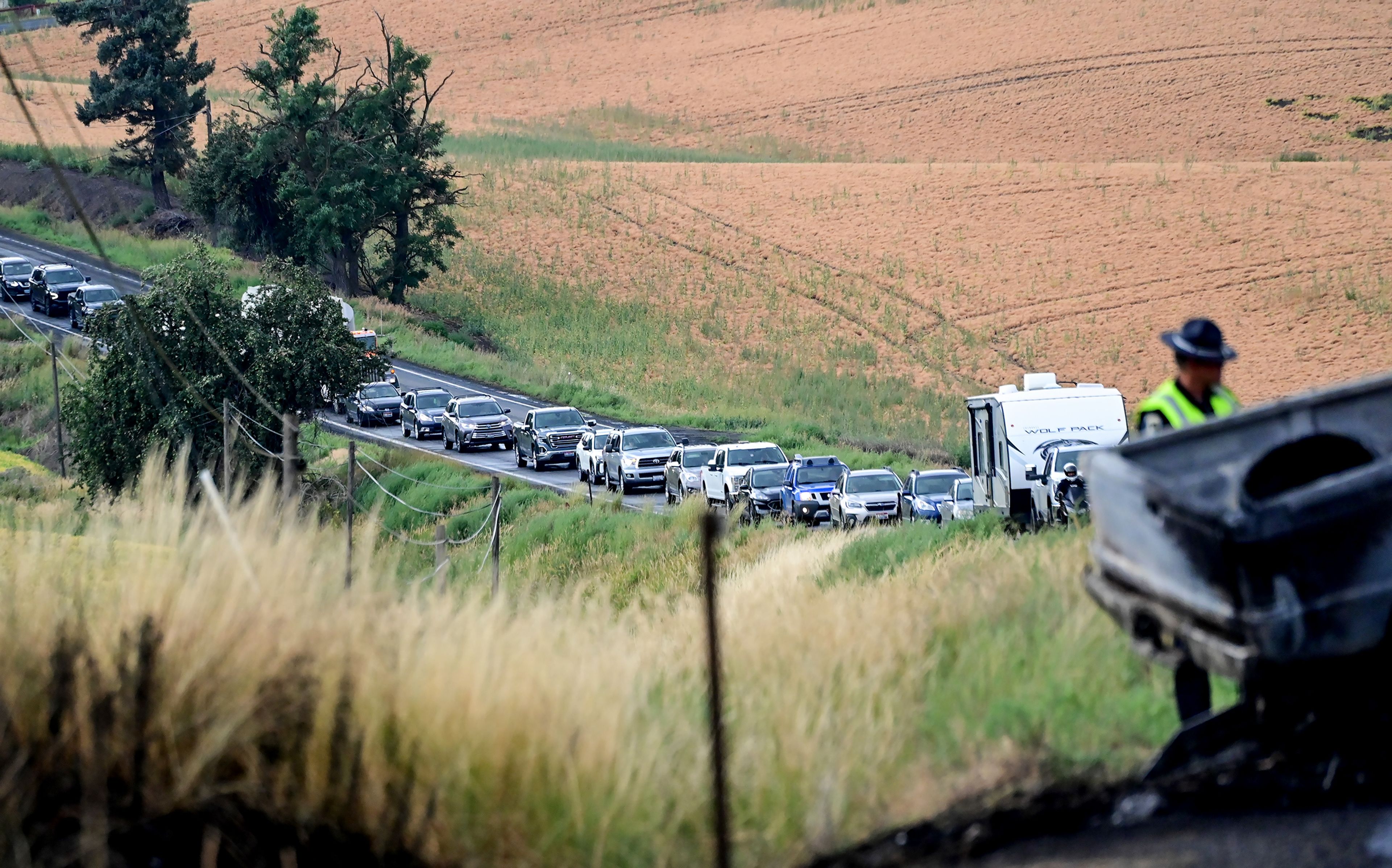 Traffic backs up along U.S. Highway 95 south of Moscow while crews work to clear wreckage from an accident near milepost 342 on Monday.