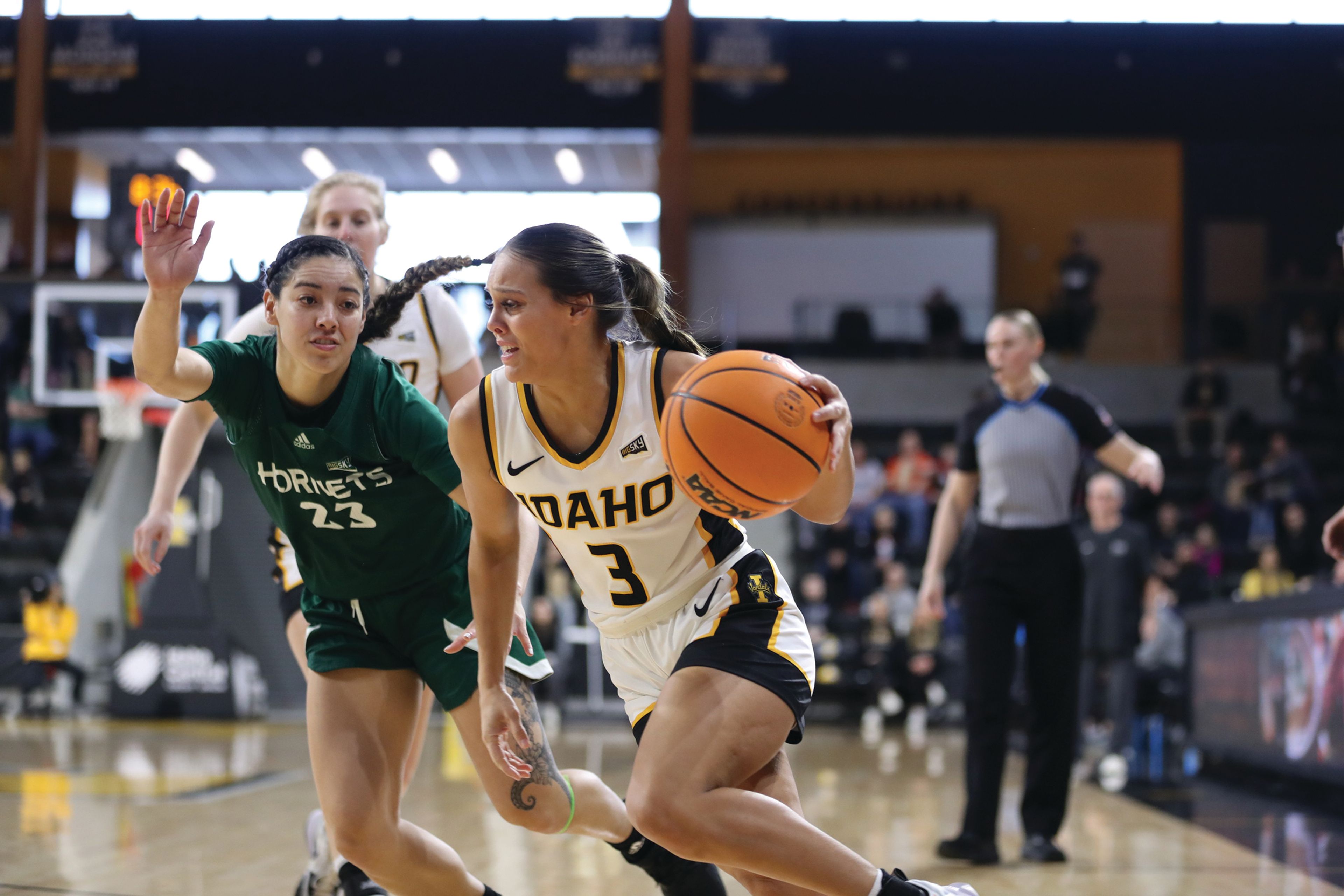 Idaho guard Ashlyn Wallace drives past Sacramento State’s Jordan Olivares during a Big Sky Conference game Feb. 5, 2023, at Idaho Central Credit Union Arena.