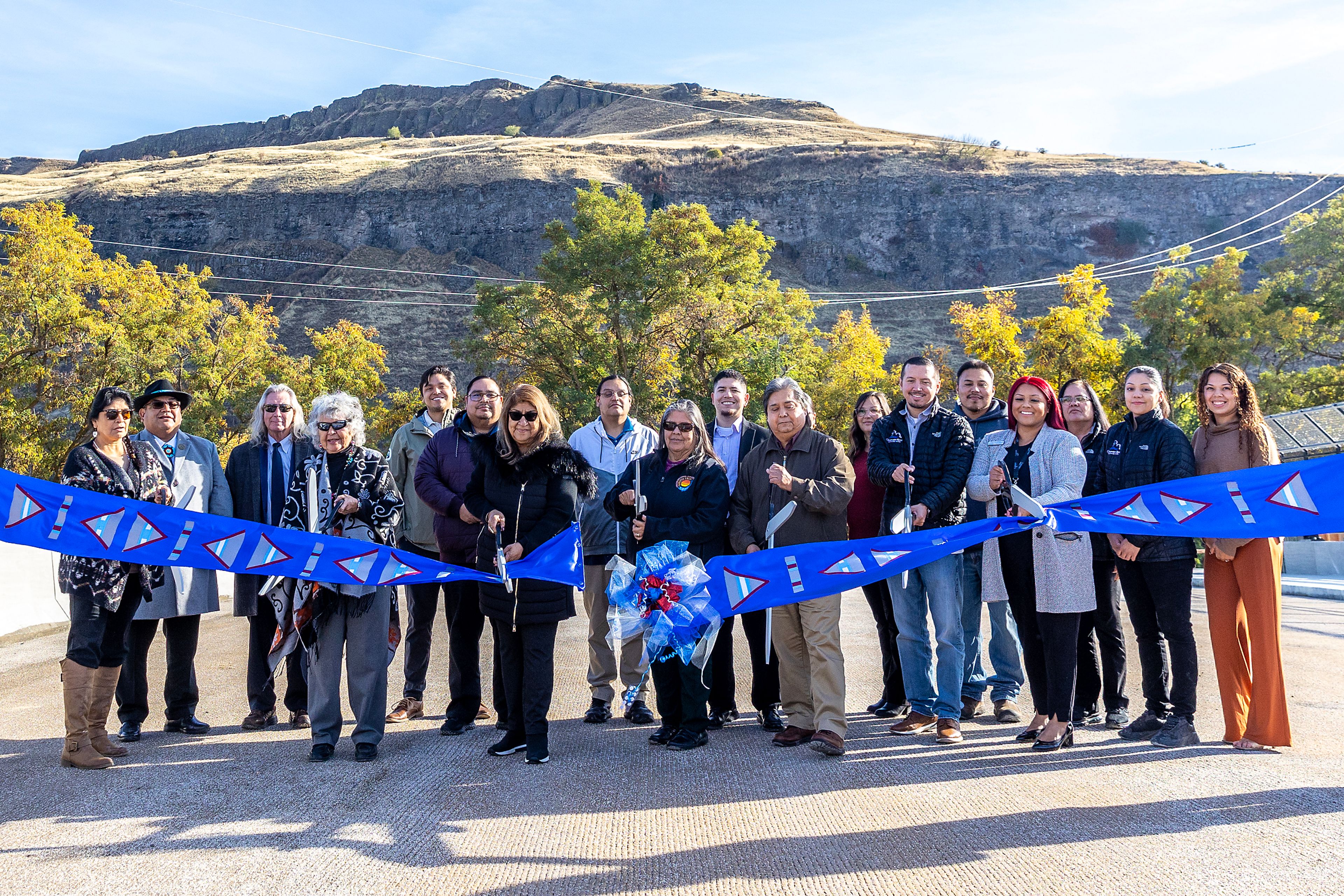 Members of the Nez Perce Tribal Executive Committee cuts the ribbon Thursday for the Aht�Wy Interchange over U.S. Highway 95/12 in Lewiston.