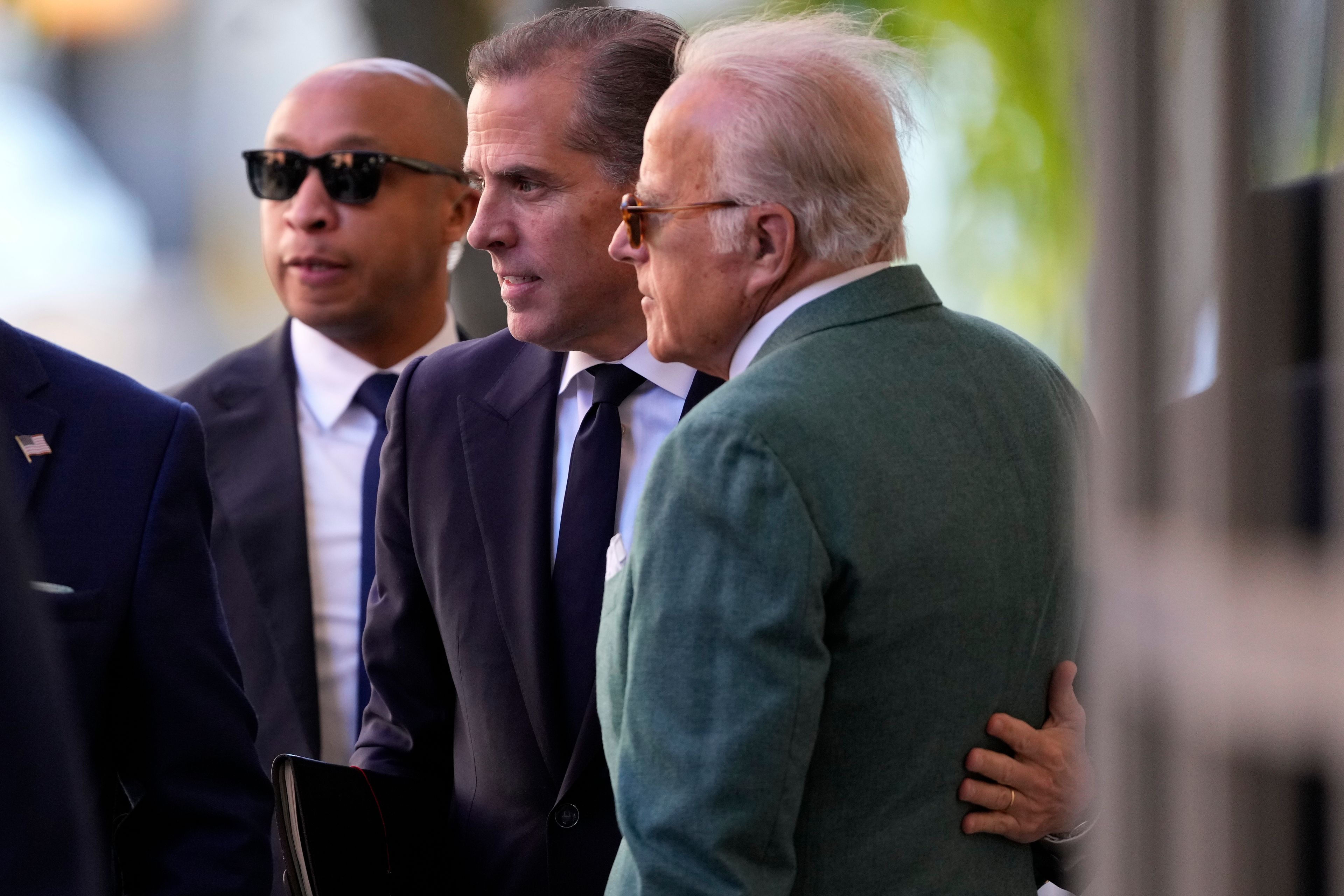 Hunter Biden greets James Biden outside federal court, Monday, June 10, 2024, in Wilmington, Del.