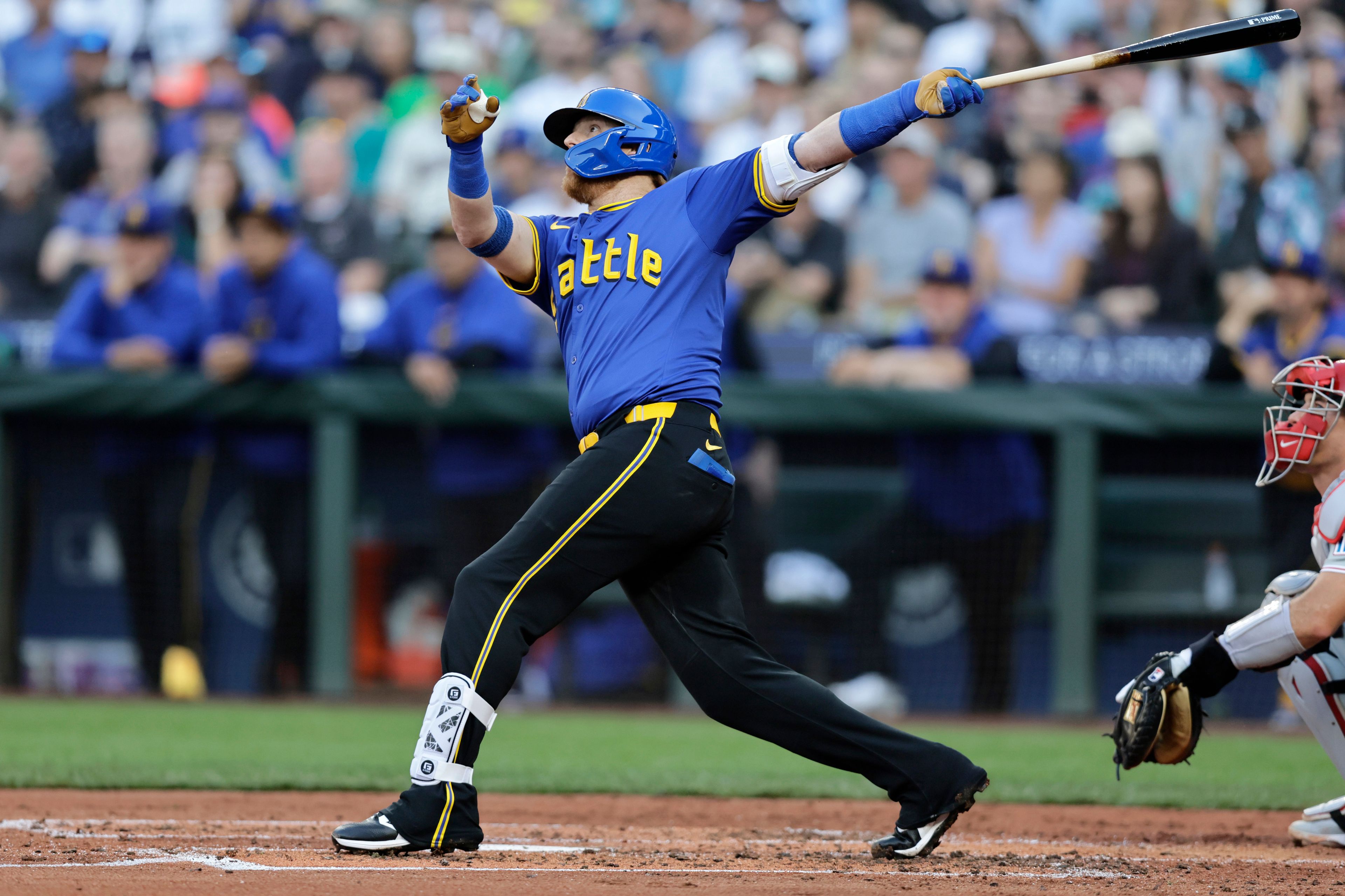 Seattle Mariners' Justin Turner hits a grand slam off Philadelphia Phillies starting pitcher Tyler Phillips during the second inning in a baseball game, Friday, Aug. 2, 2024, in Seattle. (AP Photo/John Froschauer)