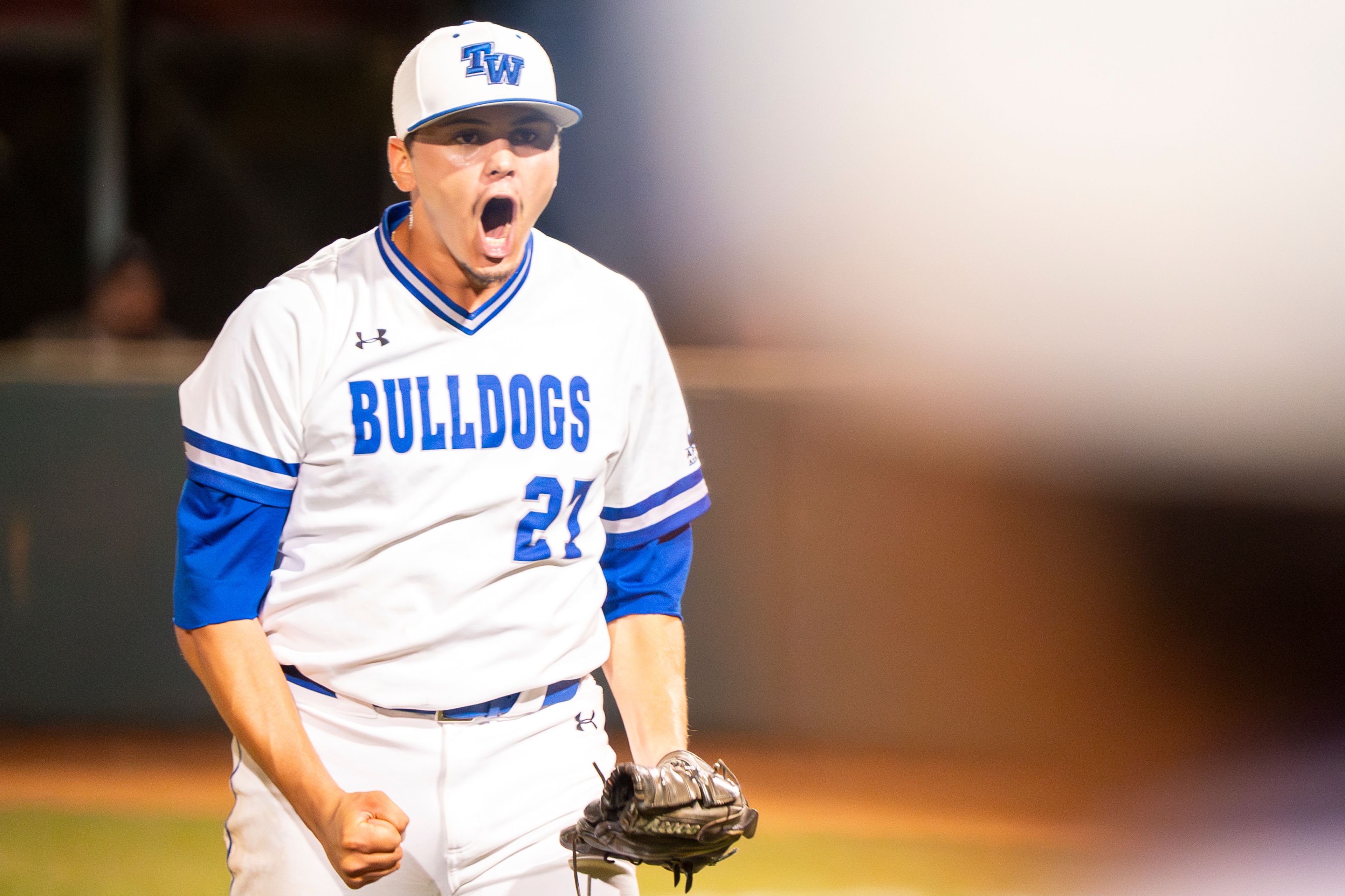 Tennessee Wesleyan pitcher Daniel Stewart celebrates after getting out of the sixth inning during Game 12 of the NAIA World Series against Georgia Gwinnett on Monday at Harris Field in Lewiston.