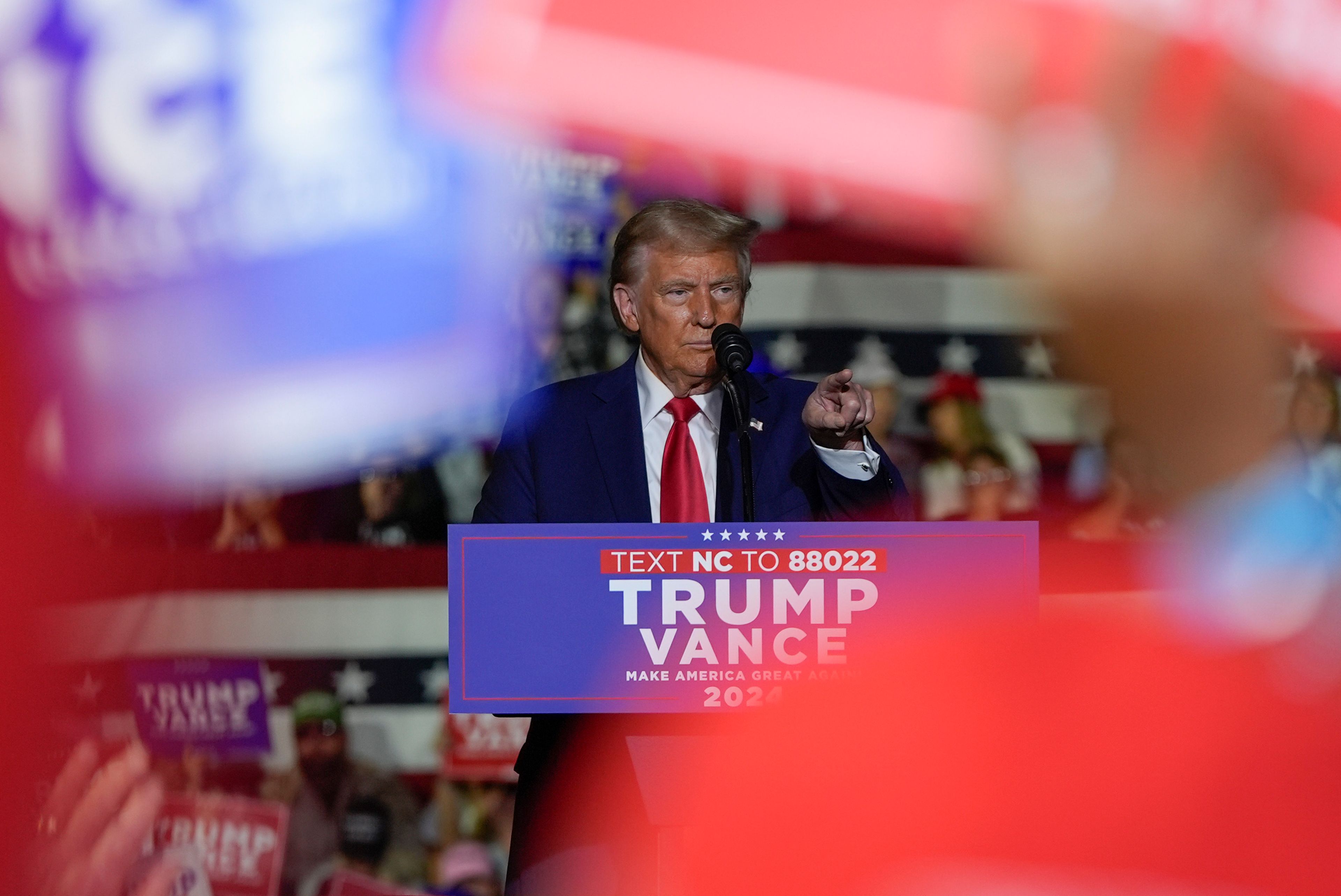 Republican presidential nominee former President Donald Trump speaks at a campaign rally at Williams Arena at Mignes Coliseum, Monday, Oct. 21, 2024, in Greenville, N.C. (AP Photo/Julia Demaree Nikhinson)