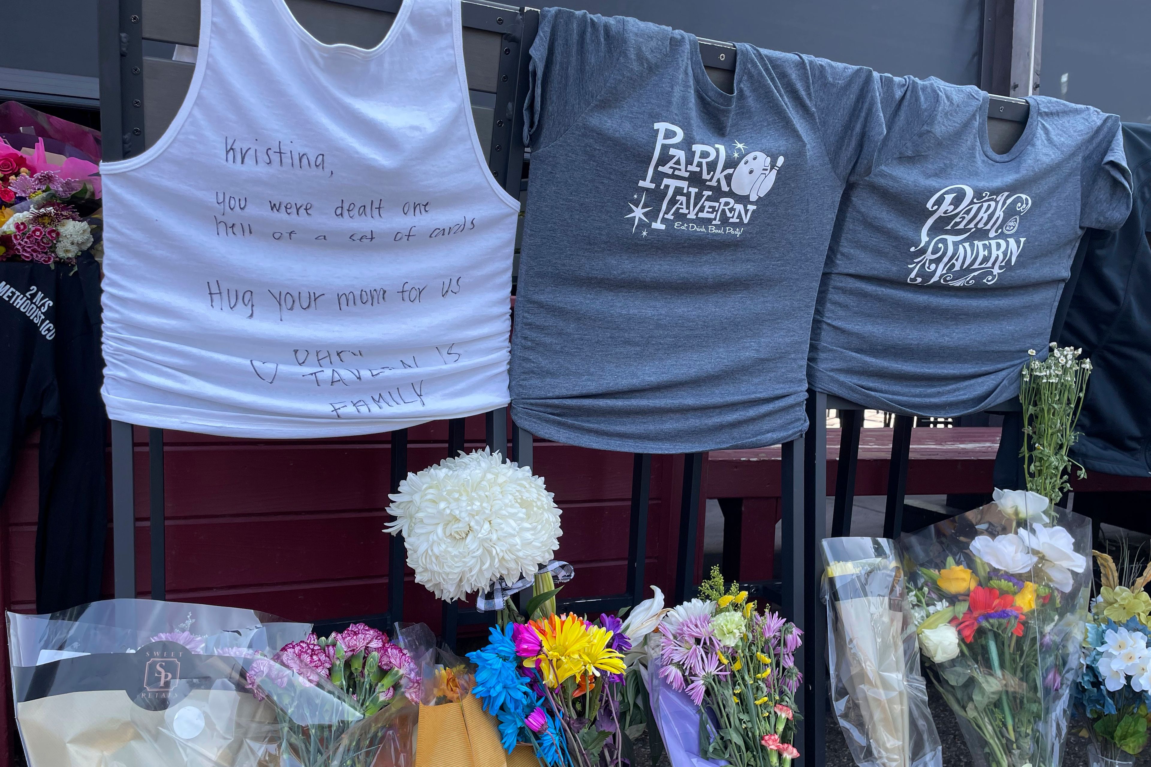 A memorial is seen on display Tuesday, Sept. 3, 2024, outside the Park Tavern in St. Louis Park, Minn., where two people died and at least four were injured Sunday, Sept. 1, after a man drove his car through the restaurant's patio.