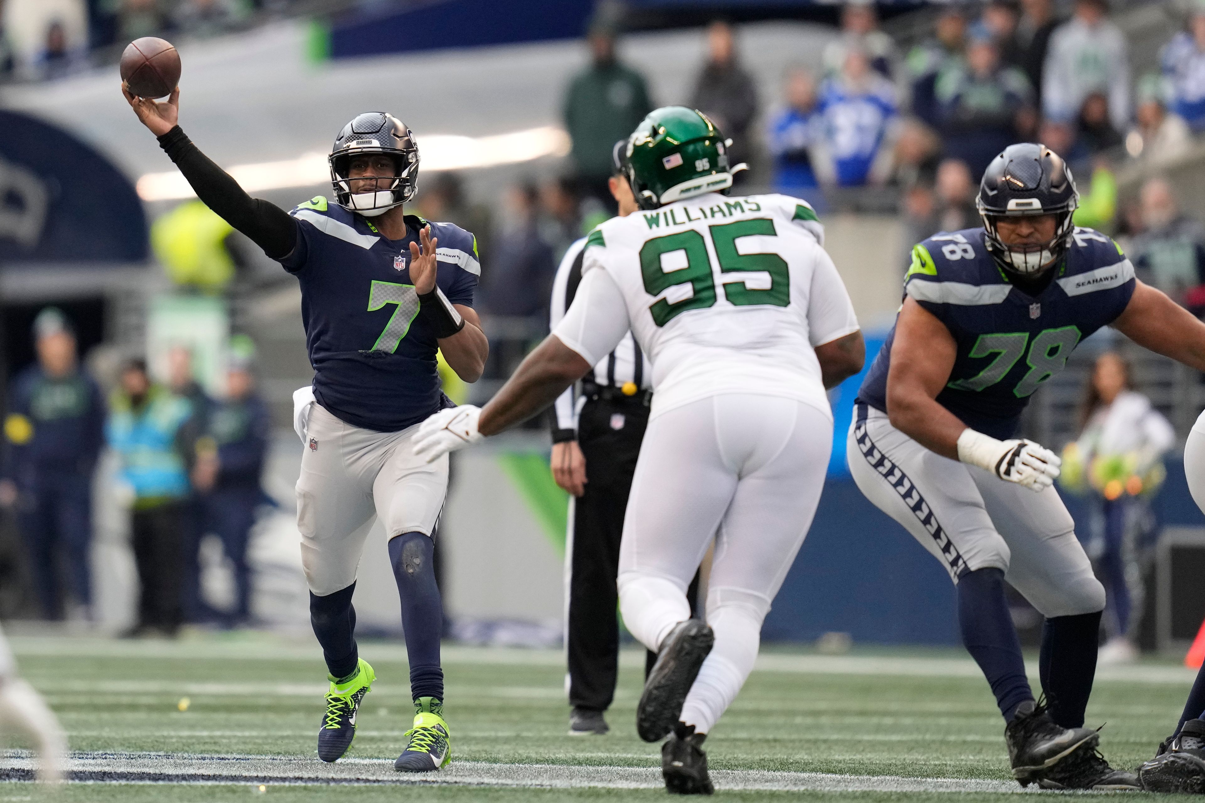 Seattle Seahawks quarterback Geno Smith (7) showers against the New York Jets during the first half of an NFL football game, Sunday, Jan. 1, 2023, in Seattle. (AP Photo/Godofredo A. Vásquez)