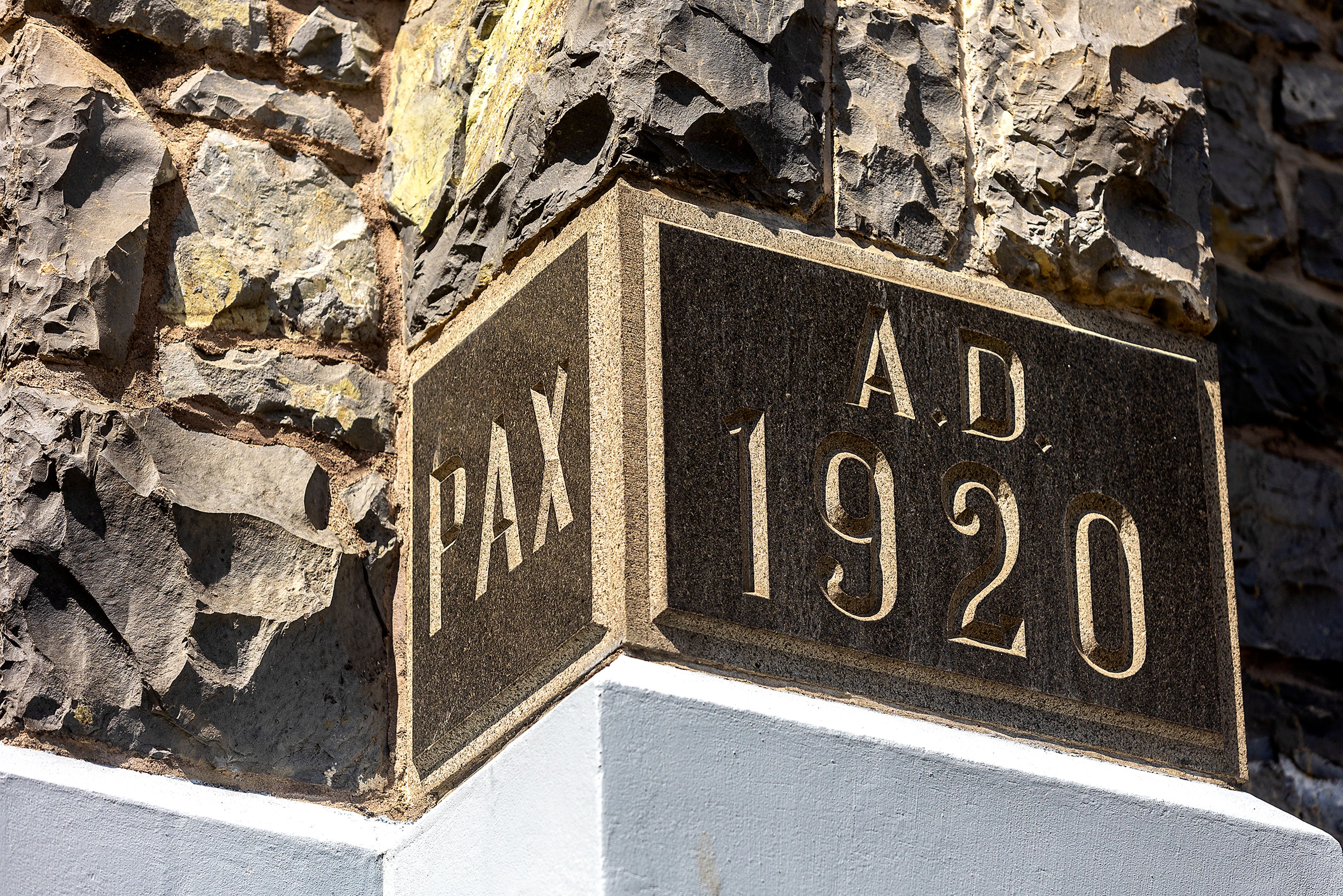 Pax A.D. 1920 is written in a stone on the outside of a wall at the St. Gertrude Monastery near Cottonwood.