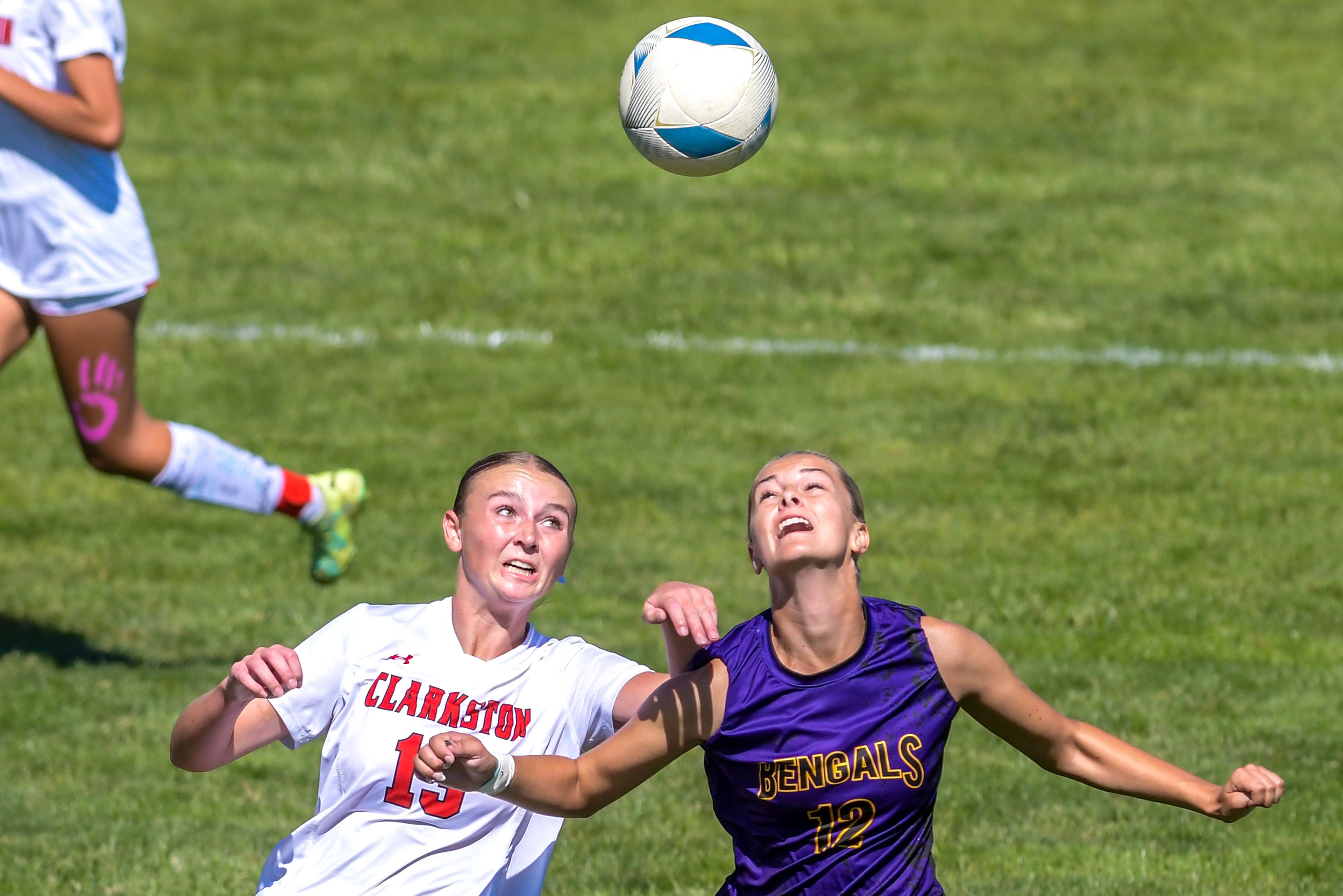 Clarkston's Rebecca Skinner and Lewiston's Taylor Musser compete for the ball during a nonconference game Sept. 21 at Walker Field in Lewiston.