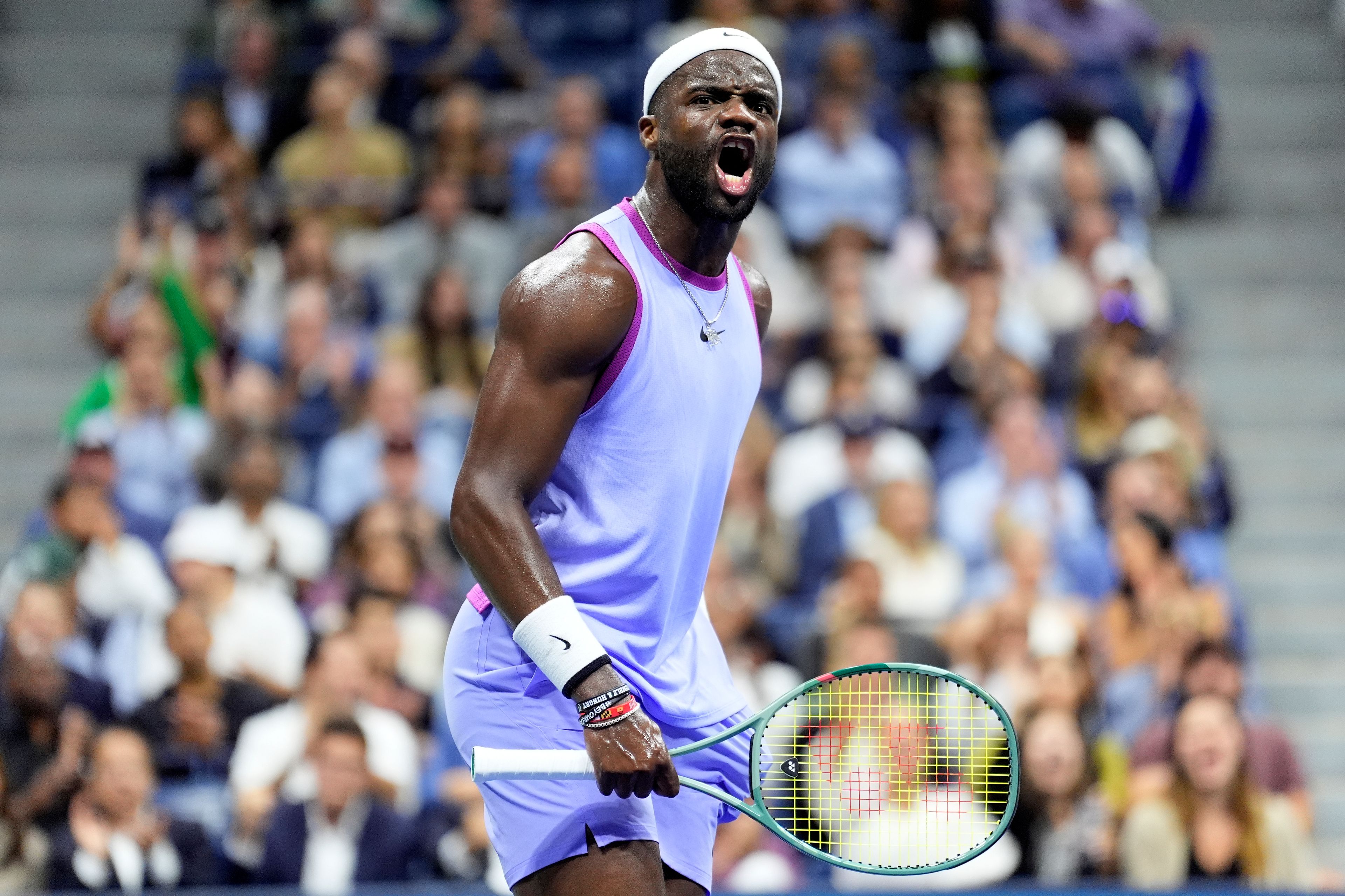 Frances Tiafoe, of the United States, celebrates after winning a point against Grigor Dimitrov, of Bulgaria, during the quarterfinals of the U.S. Open tennis championships, Tuesday, Sept. 3, 2024, in New York.