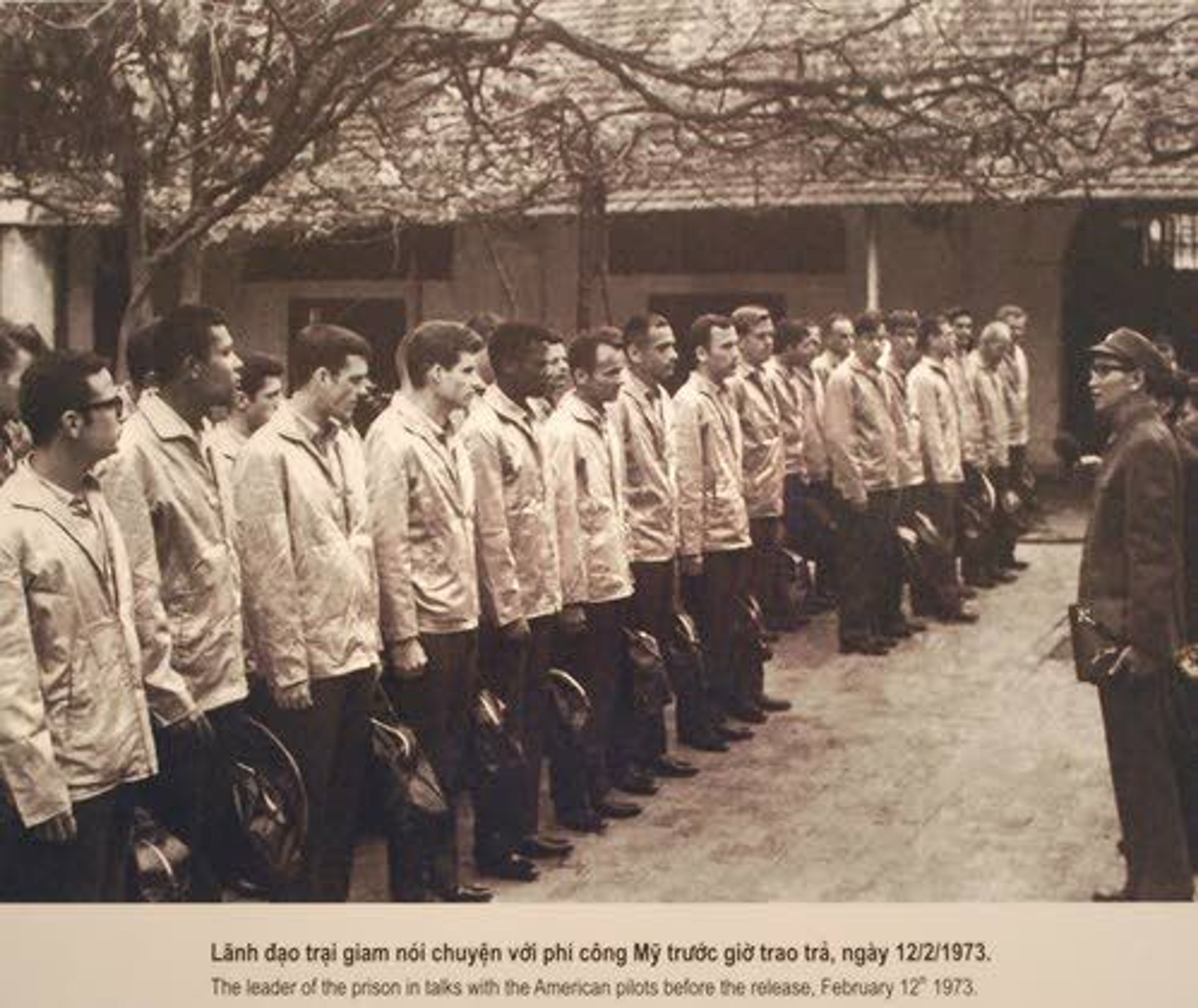 This photo was taken at the Hoa Lo (Hanoi Hilton), where a museum now has an exhibit room for American POWs. This is the second group of POWs, released on March 15, 1973. Bob Chenoweth is the fifth man from the right in the lineup.