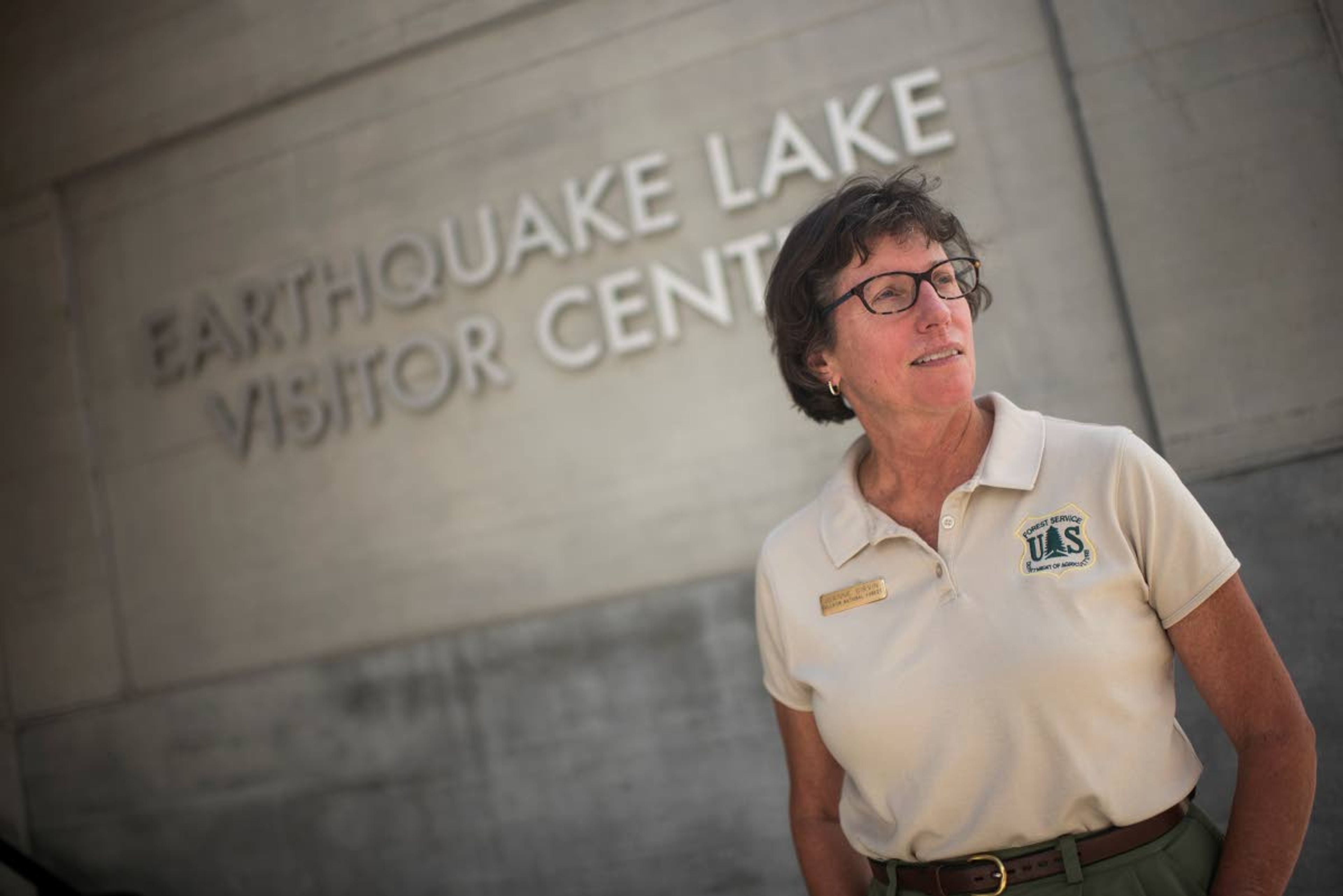 Joanne Girvin poses for a photo Aug. 1 at the Earthquake Lake Visitor Center. She runs the center for the Forest Service and has told the story many times.