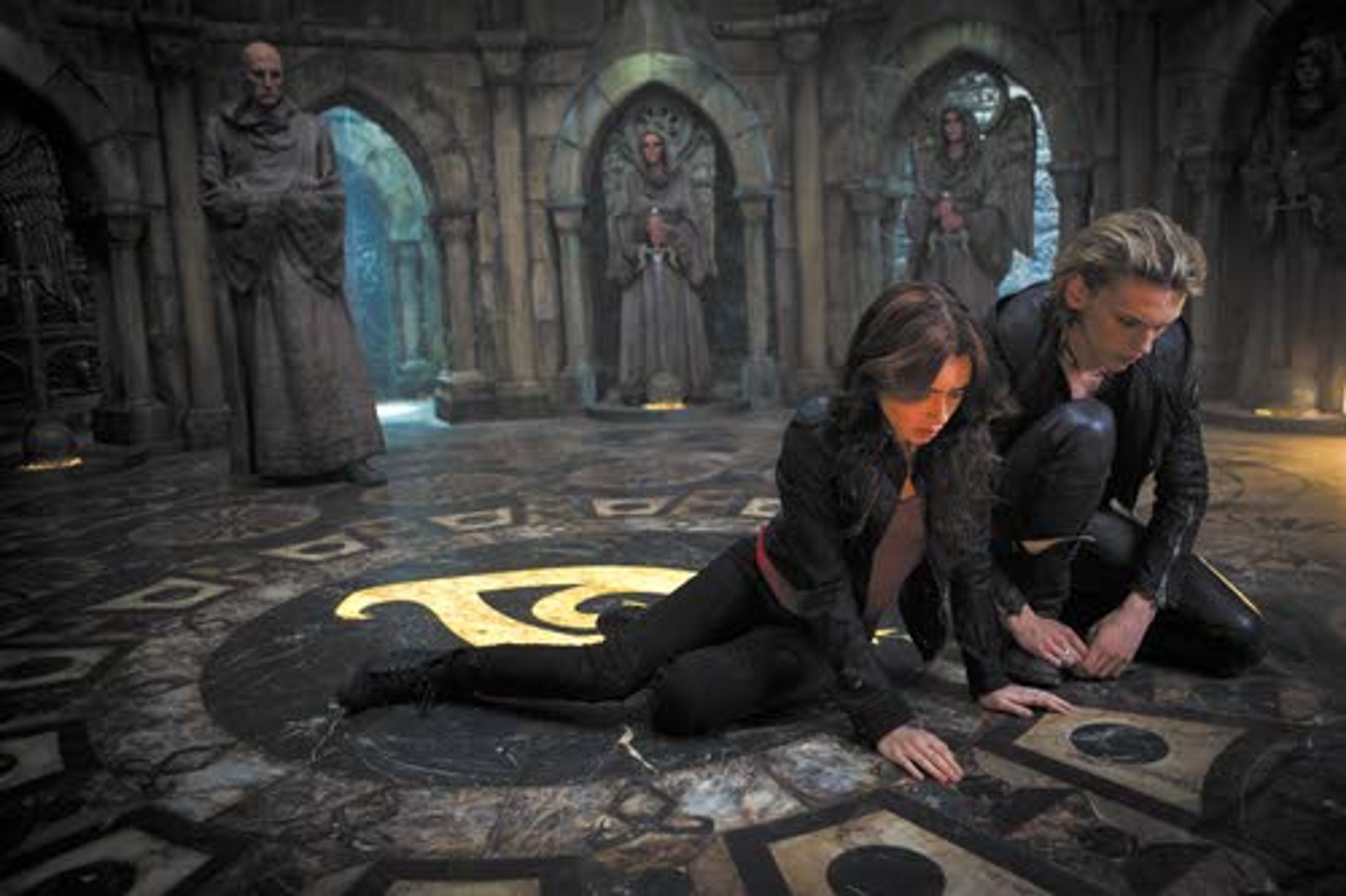 AP Photo/Sony Pictures Screen Gems, RafyBIRTHDAY GIRL TURNED DEMON HUNTER — Jamie Campbell Bower plays Jace (right) and Lily Collins is Clary in a scene from “The Mortal Instruments: City of Bones.