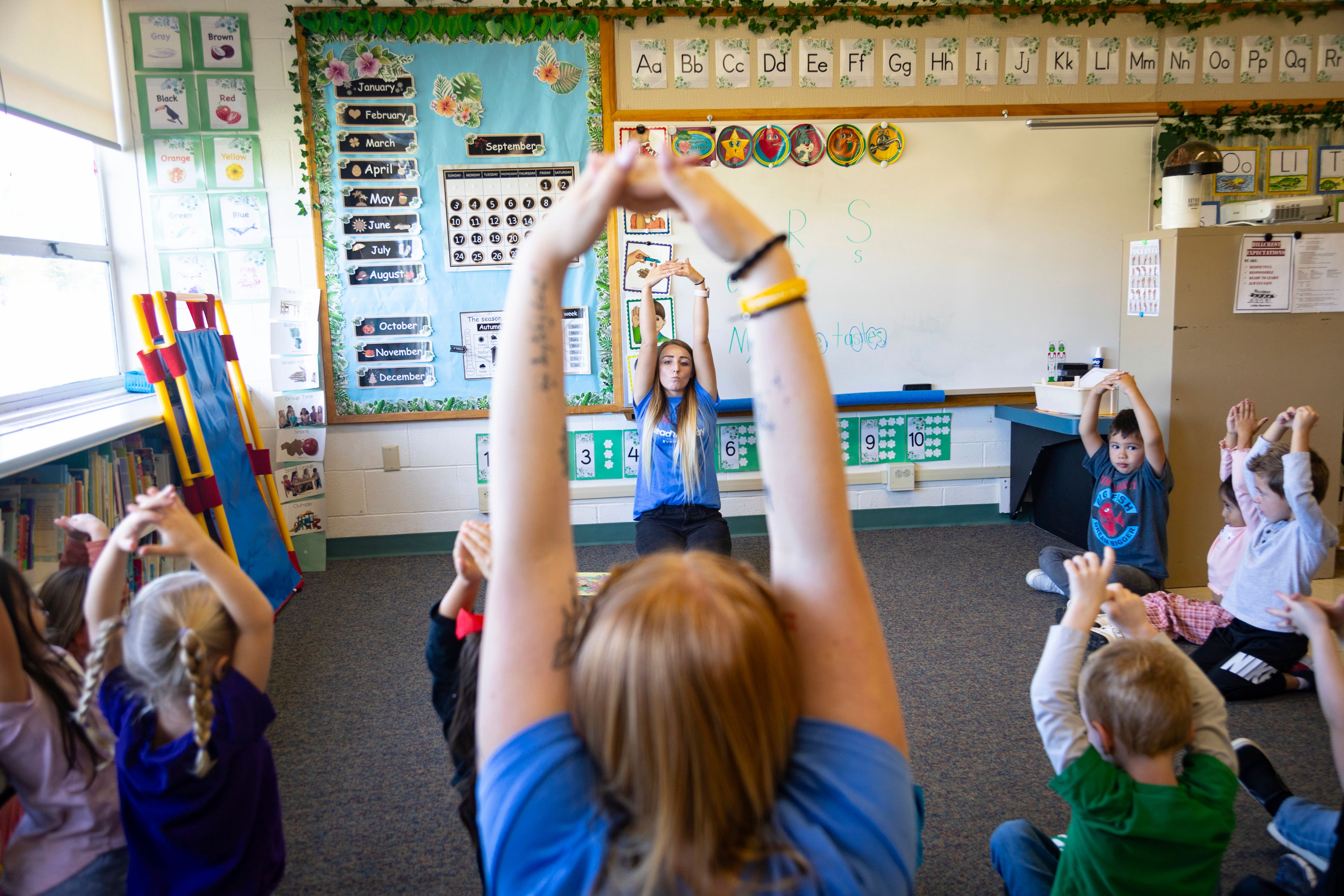 FILE - Teacher Abi Hawker leads preschoolers in learning activities at Hillcrest Developmental Preschool in American Falls, Idaho, Sept. 28, 2023.