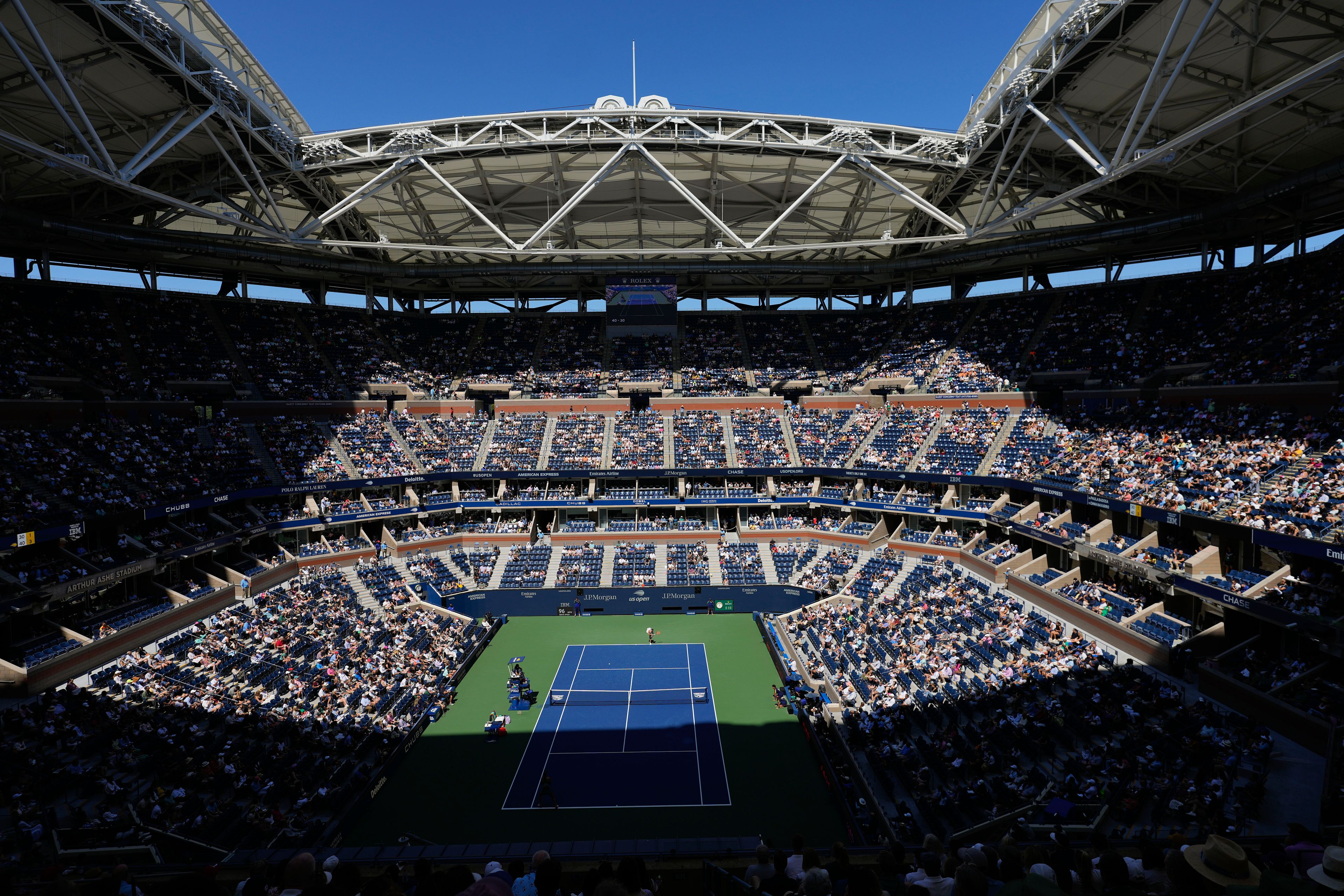 Emma Navarro, of the United States, serves to Paula Badosa, of Spain, during the quarterfinals of the U.S. Open tennis championships, Tuesday, Sept. 3, 2024, in New York.