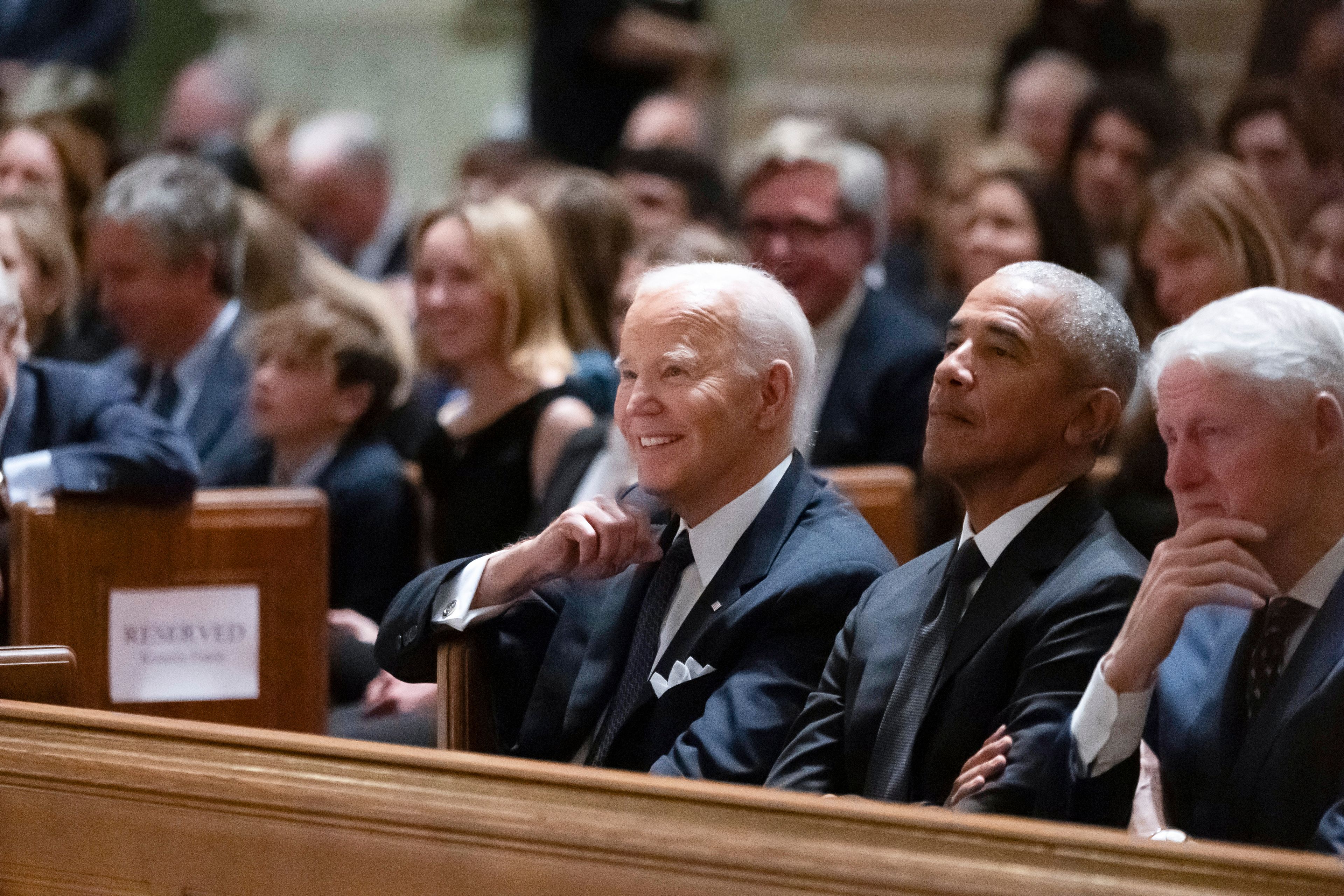 President Joe Biden, left, and former Presidents Barack Obama, center, and Bill Clinton, right, attend a memorial service for Ethel Kennedy, the wife of Sen. Robert F. Kennedy, who died on Oct. 10, 2024, at age 96, at the Cathedral of St. Matthew the Apostle in Washington, Wednesday, Oct. 16, 2024. (AP Photo/Ben Curtis)