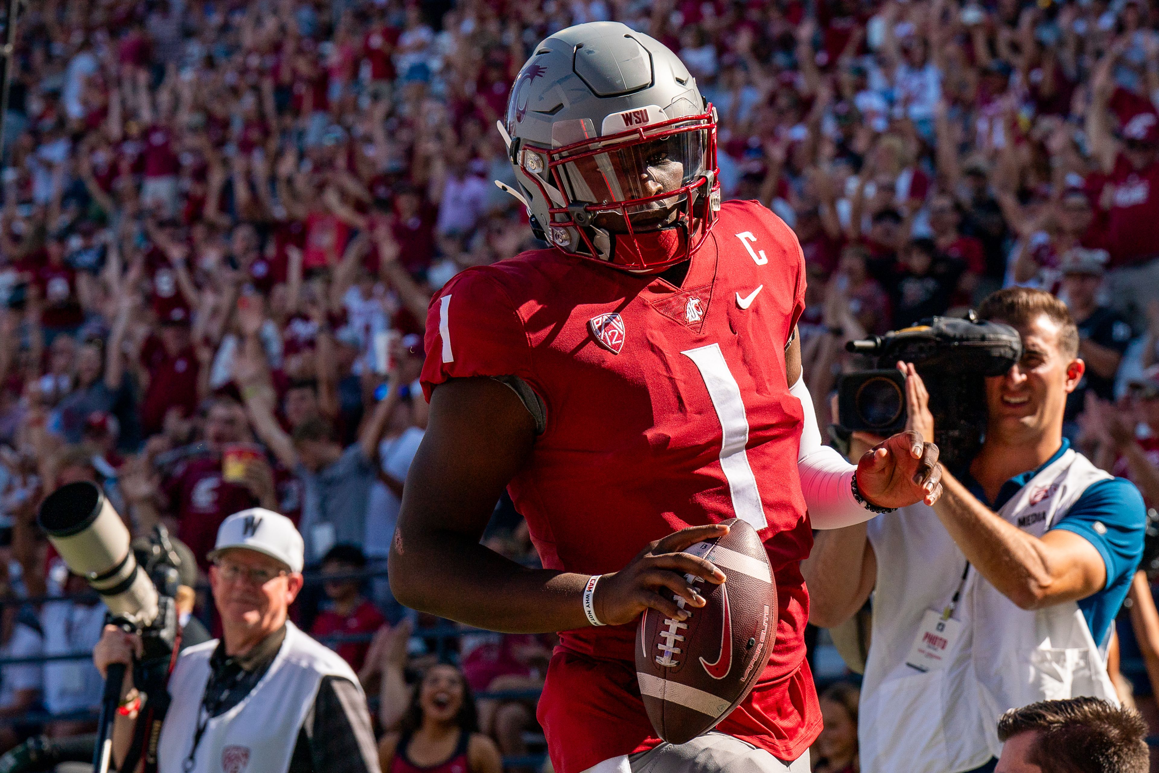 Washington State quarterback Cameron Ward runs into the end zone to score a touchdown during a game against Northern Colorado on Sept. 16 at Gesa Field in Pullman.