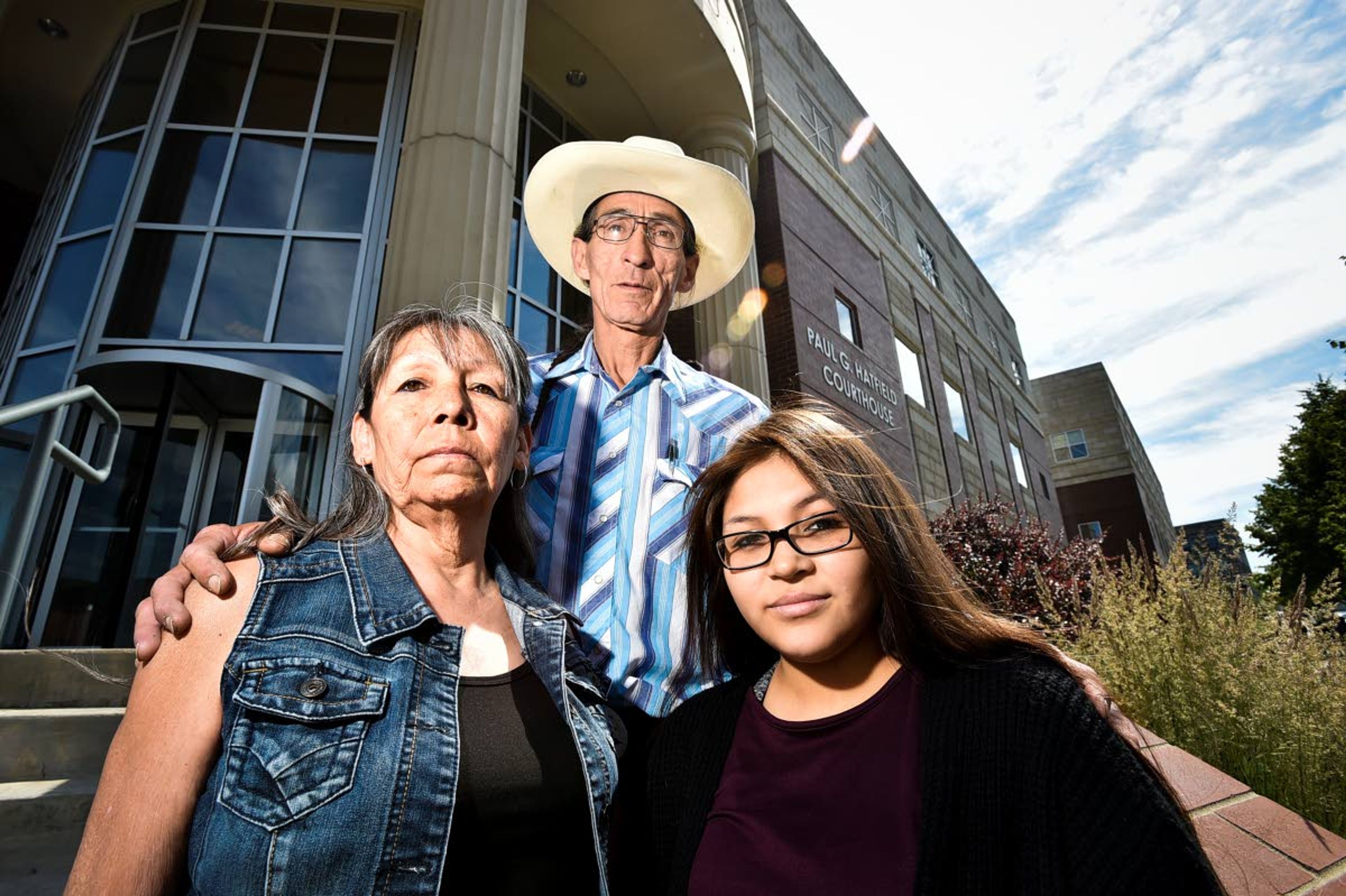 Family members of Steven Bearcrane Cole (from left) his mother, Earline Bearcrane Cole, father Cletus Cole and daughter Precious Bearcrane, are shown Tuesday on the steps of the Paul G. Hatfield Federal Courthouse in Helena, Mont. Steven Bearcrane Cole was slain in 2004.