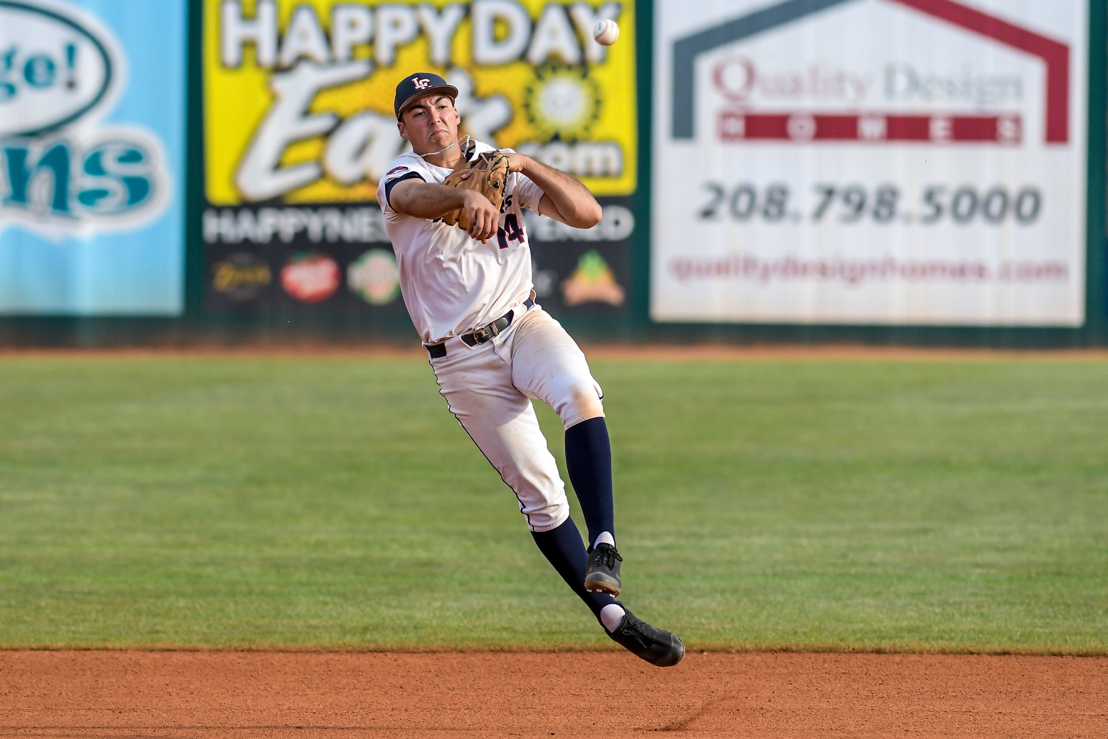 Lewis-Clark State shortstop Dominic Signorelli throws to first against UBC in an inning of a first round game of the NAIA Opening Round Monday at Harris Field in Lewiston.