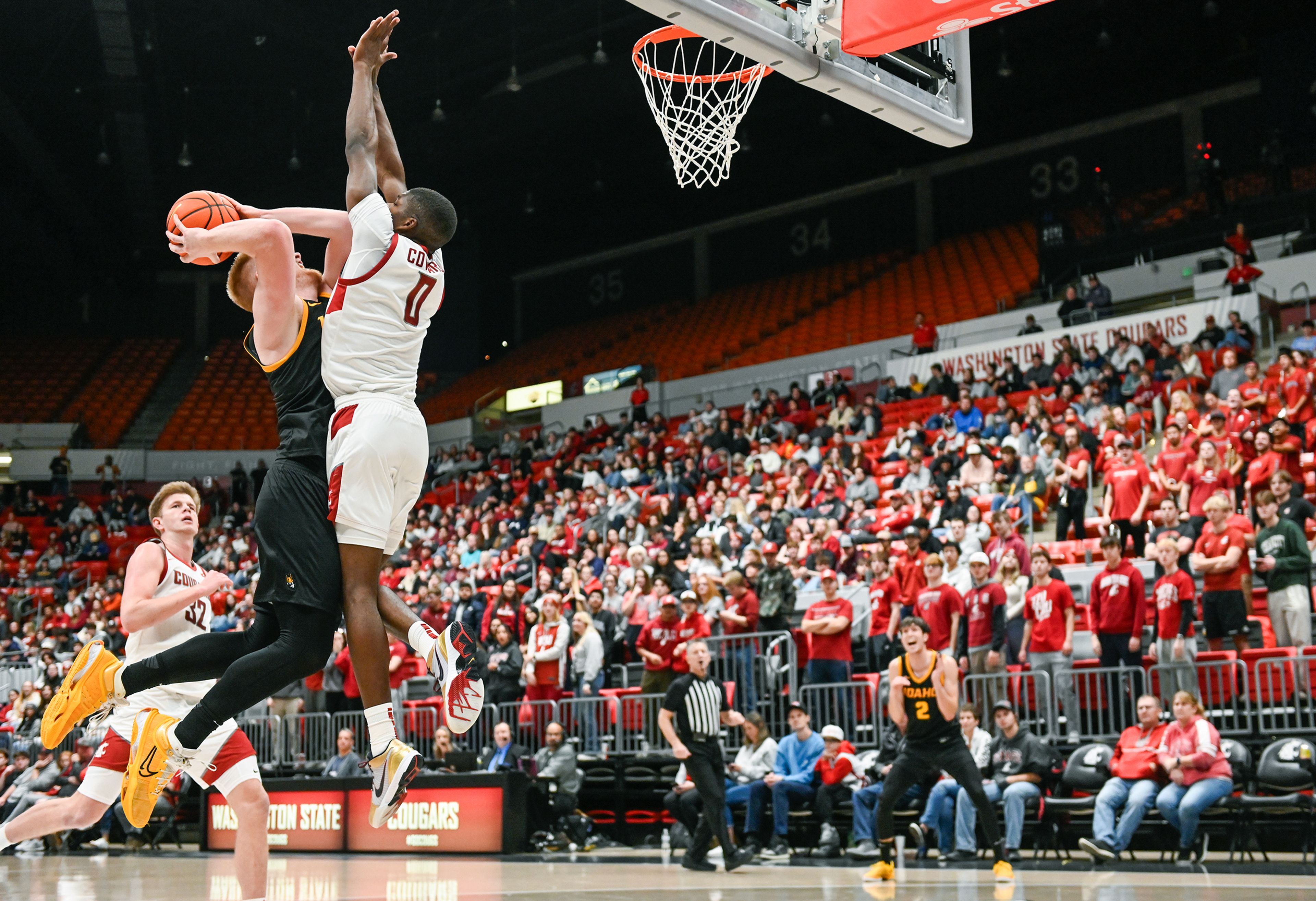 Idaho forward Kyson Rose’s two-point attempt is blocked by Washington State guard Cedric Coward during the Battle of the Palouse game at Beasley Coliseum in Pullman.