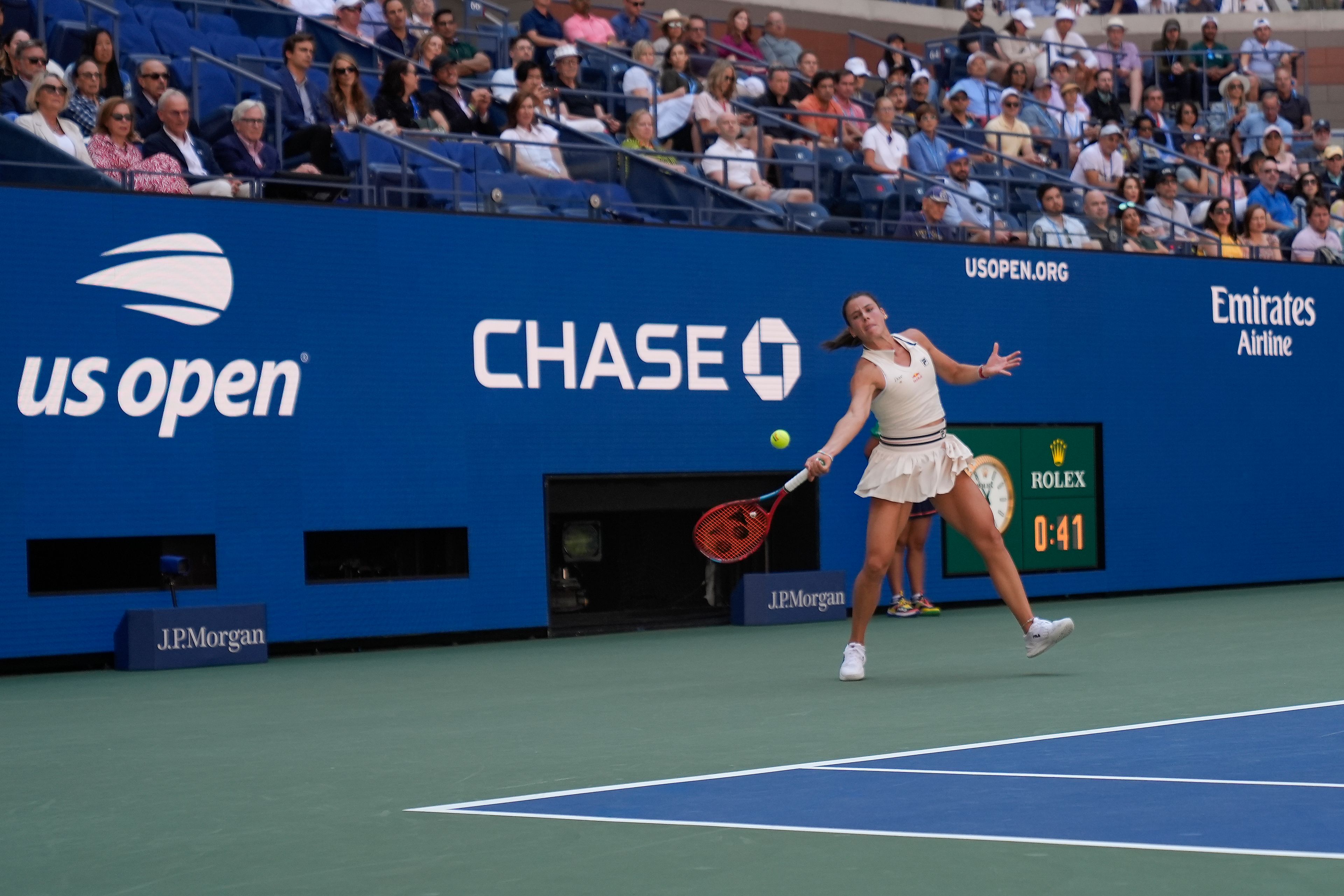 Emma Navarro, of the United States, returns a shot to Paula Badosa, of Spain, during the quarterfinals of the U.S. Open tennis championships, Tuesday, Sept. 3, 2024, in New York.