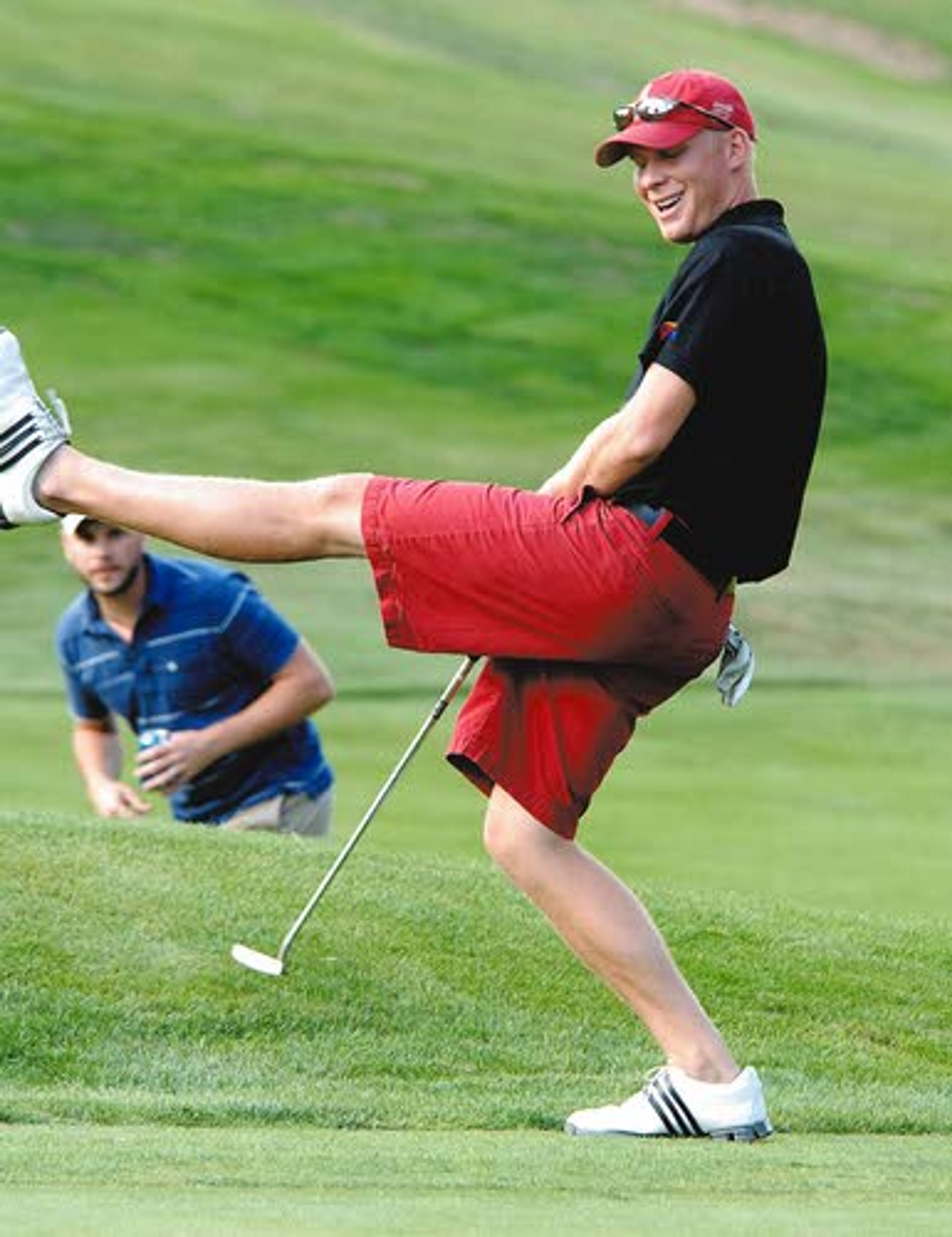 Geon Bonnalie tries to use some body english to coax the ball into the hole.