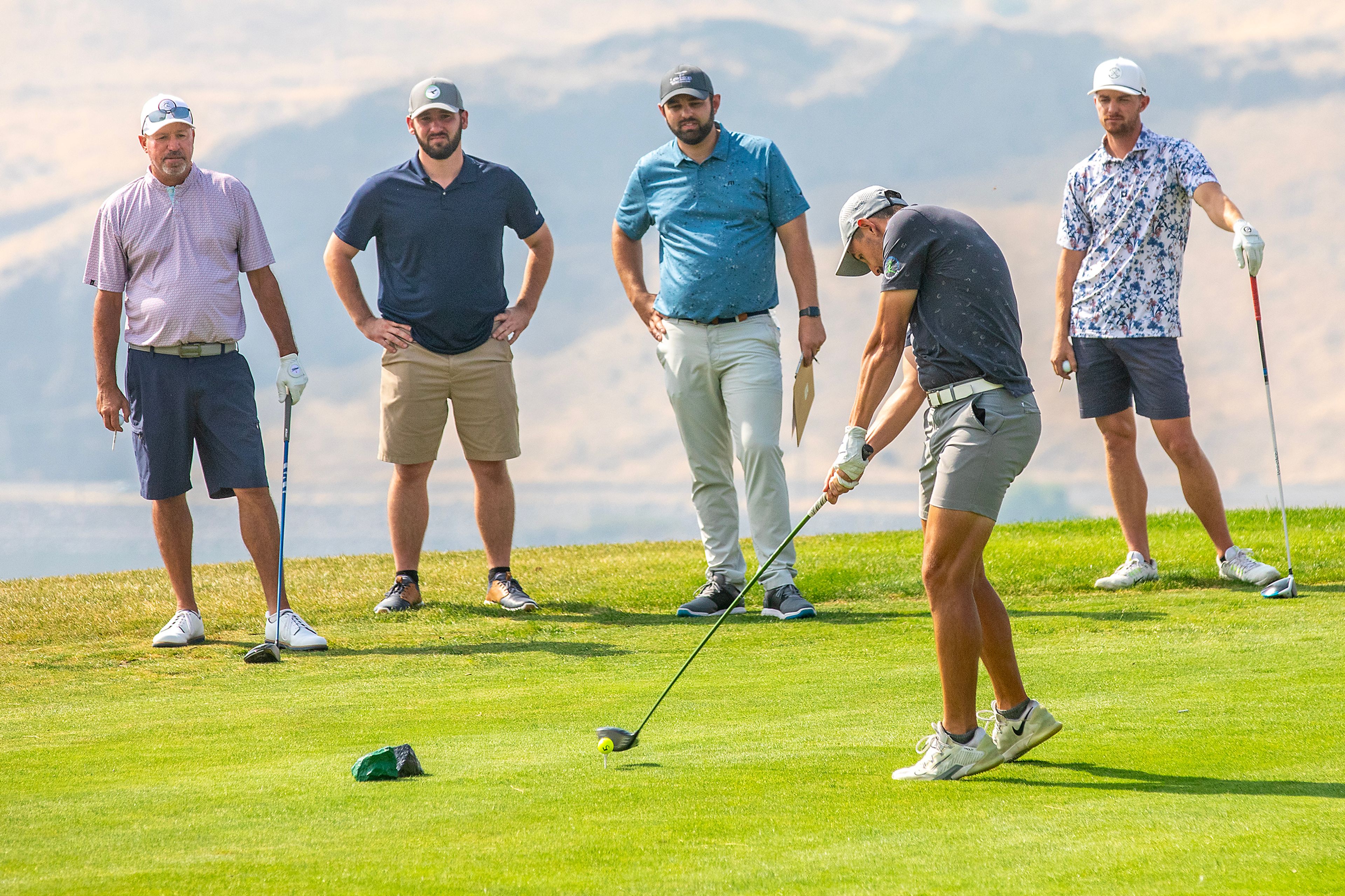 Kurt Simmons connects with his ball at the Sole Survivor Tournament Monday at the Lewiston Golf and Country Club.