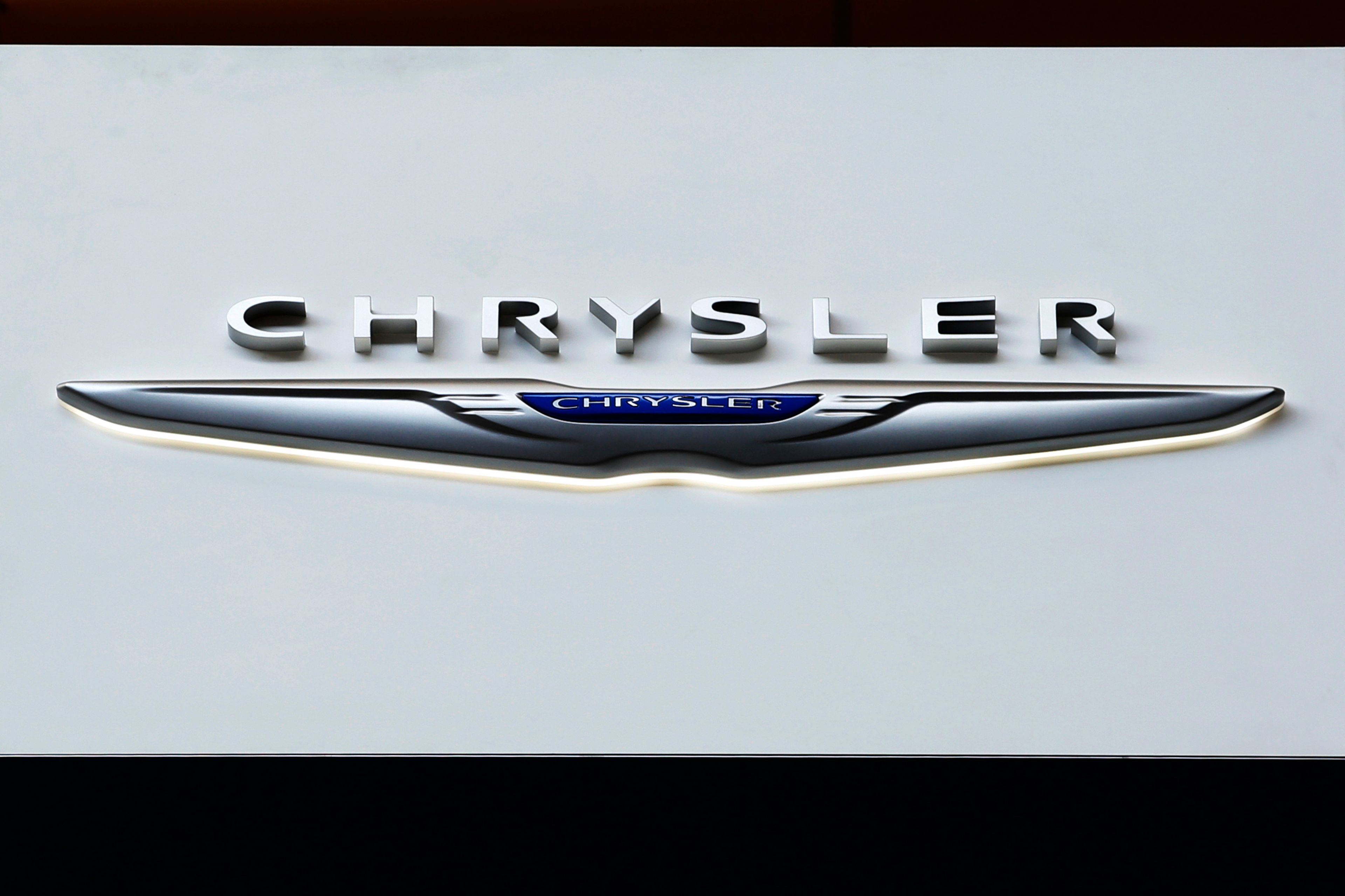 FILE - The Chrysler logo is on display at the Pittsburgh International Auto Show, Feb. 11, 2016, in Pittsburgh. On Saturday, June 8, 2024, the National Highway Traffic Safety Administration announced that Chrysler is recalling more than 211,000 SUVs and pickup trucks in the U.S., due to a software malfunction that could disable the cars' electronic stability control systems.